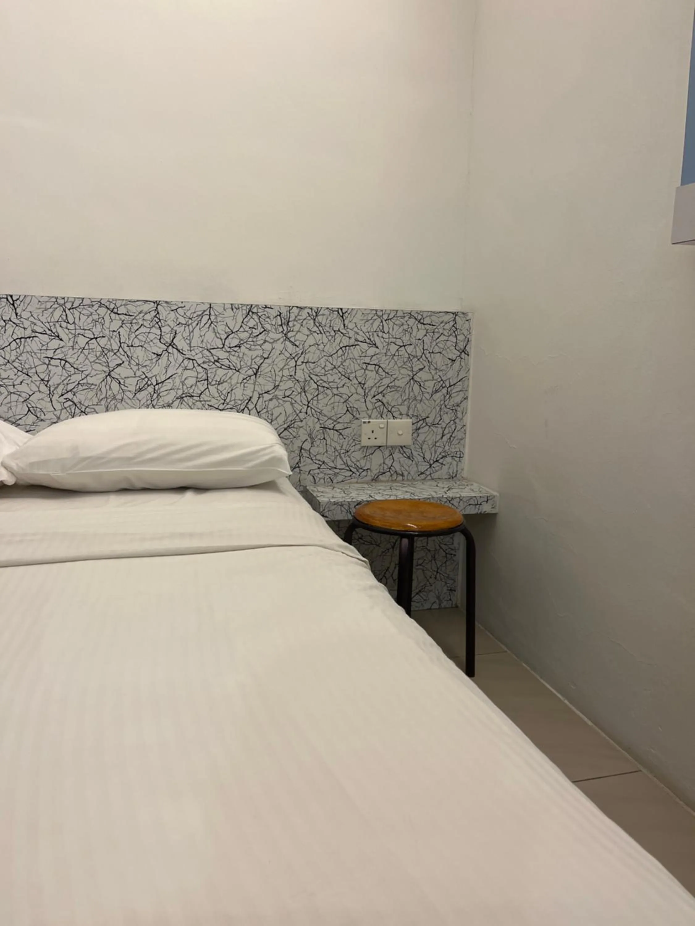 Bed in Coastline Hotel