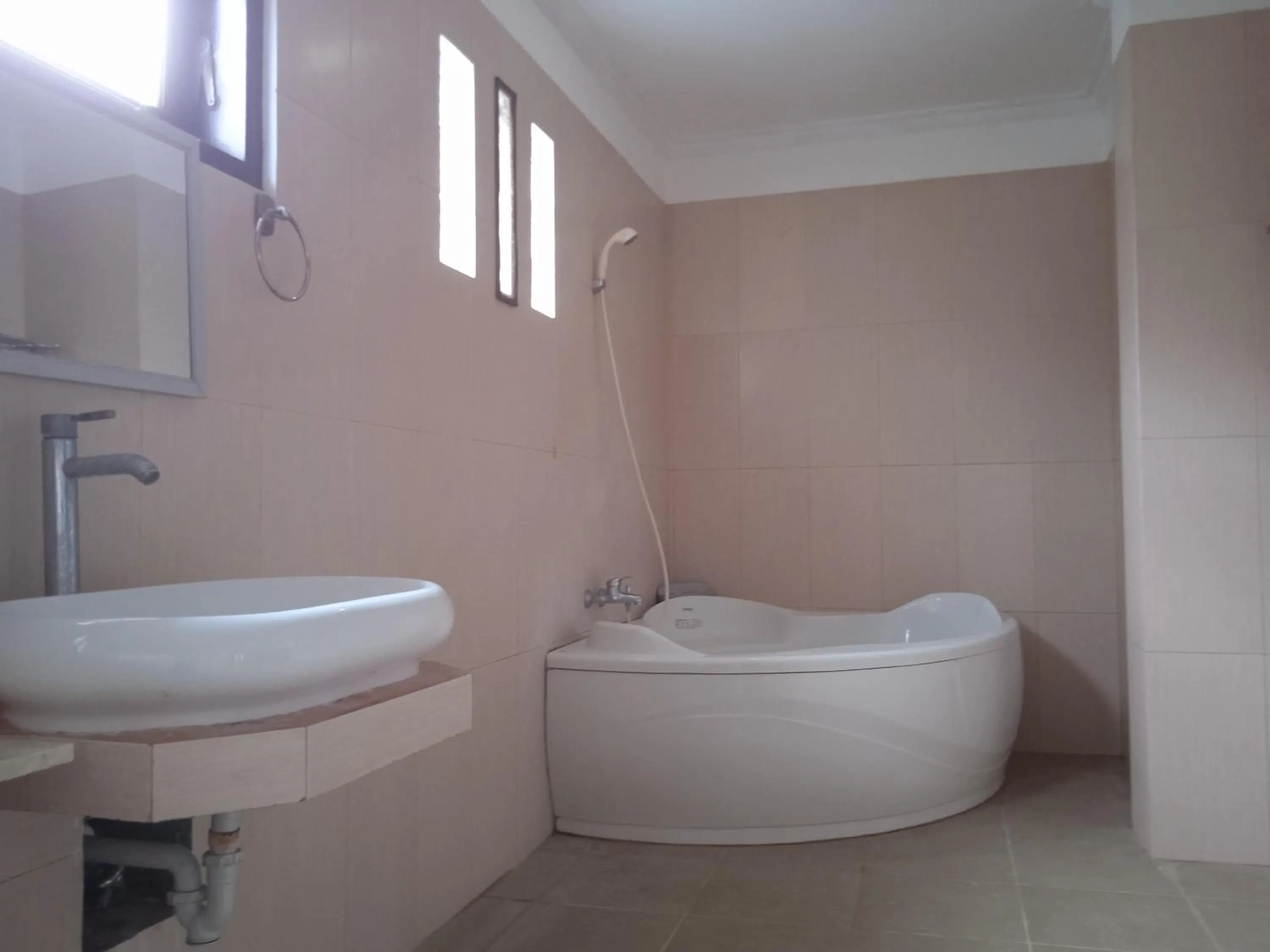 Bathroom in family house hotel kuta