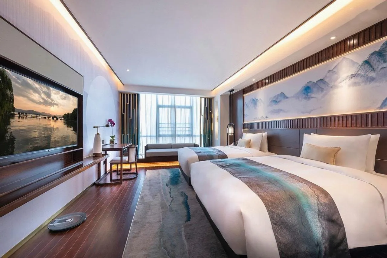 Bed in New Century Hotel Qianchao Hangzhou