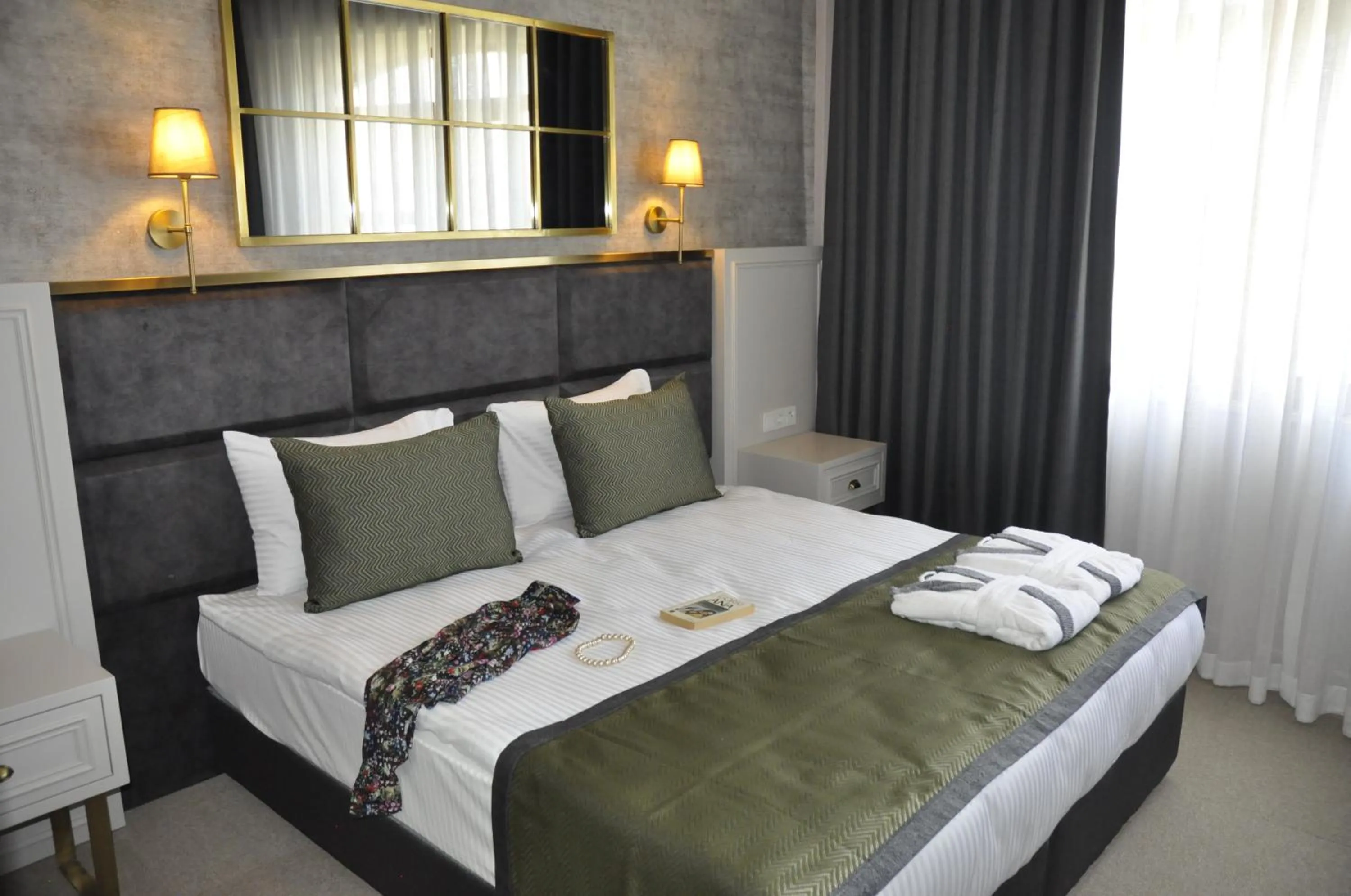 Bed in CONNECT THERMAL HOTEL