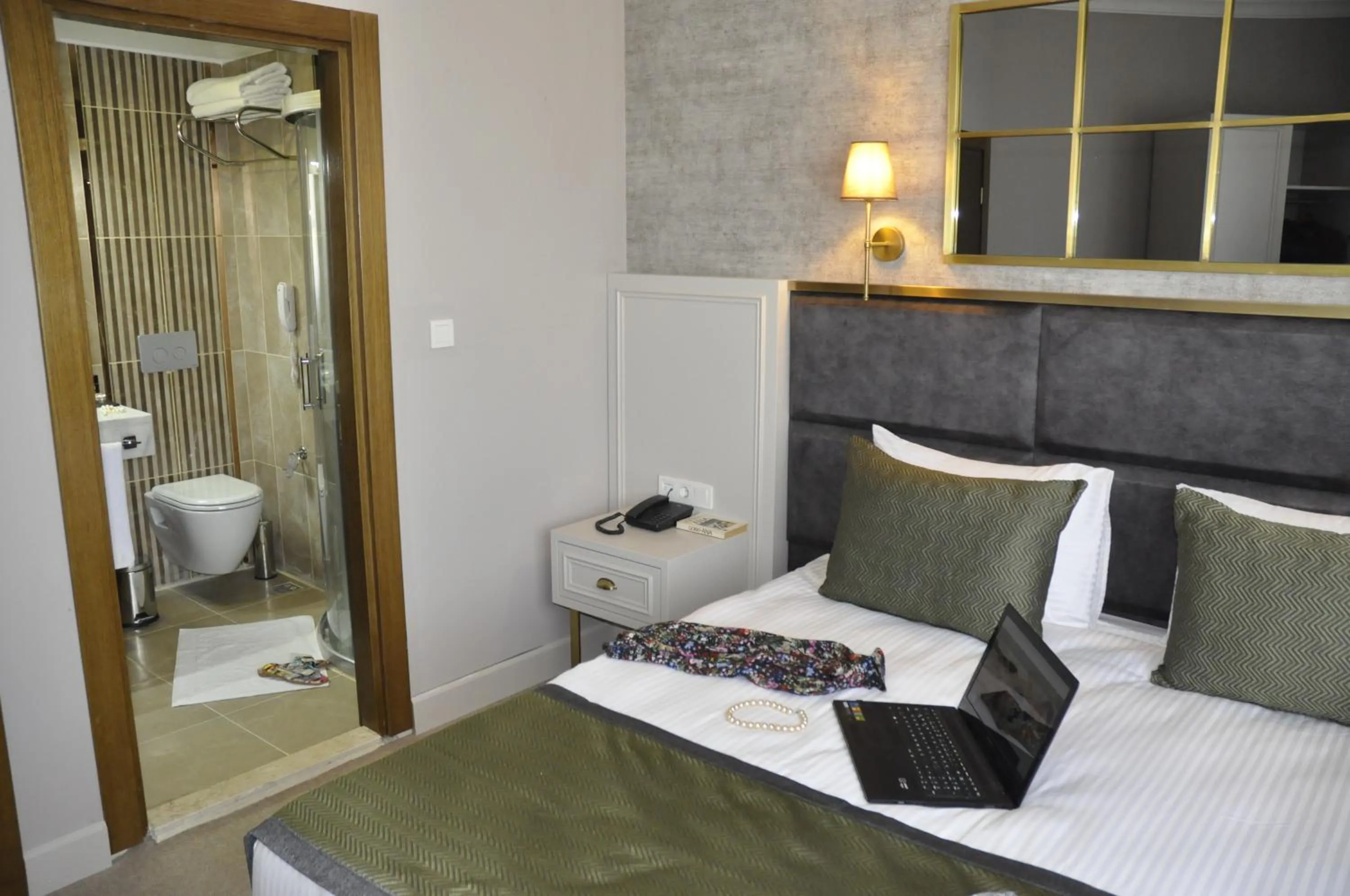 Bed in CONNECT THERMAL HOTEL