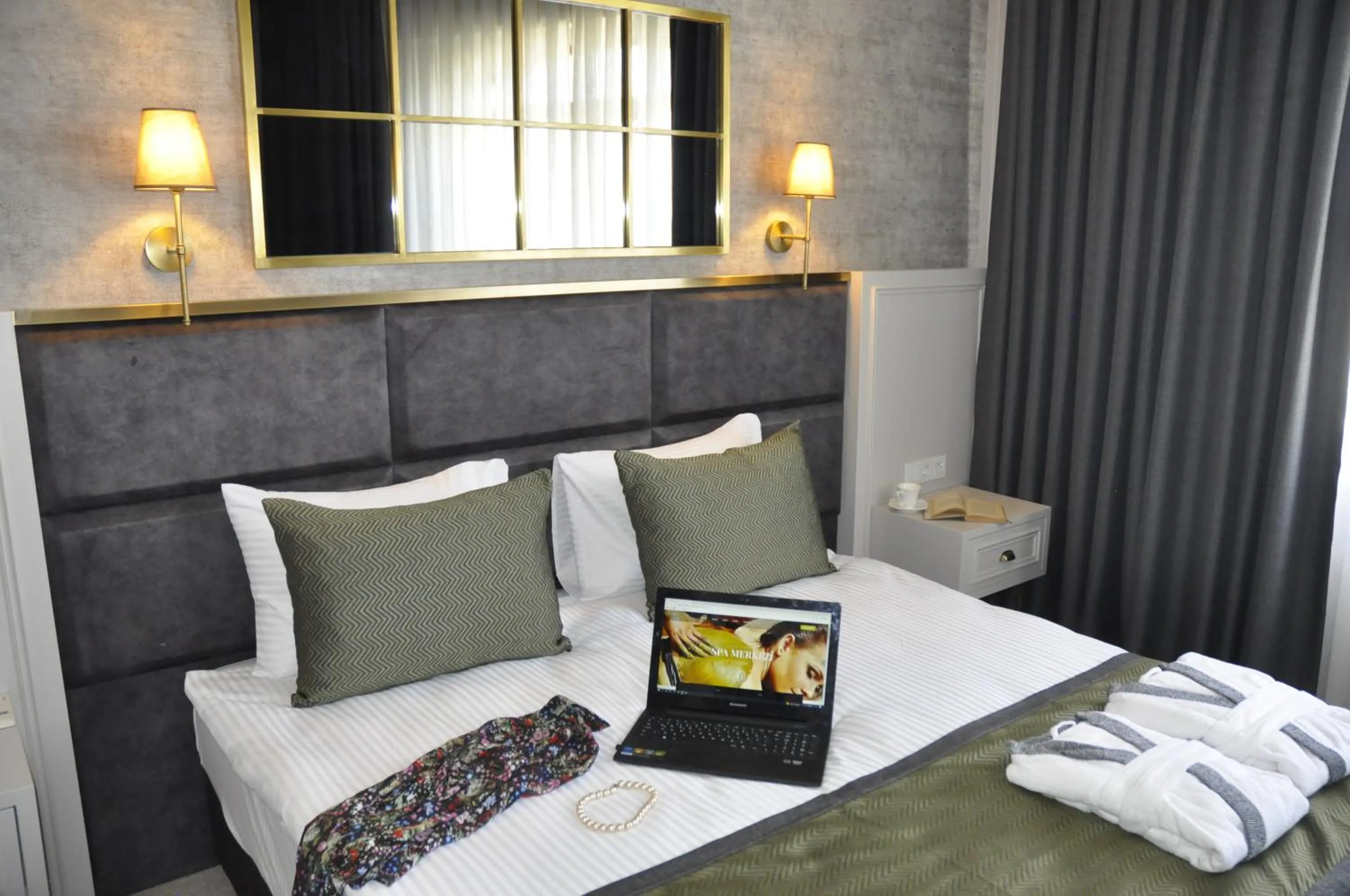 Bed in CONNECT THERMAL HOTEL