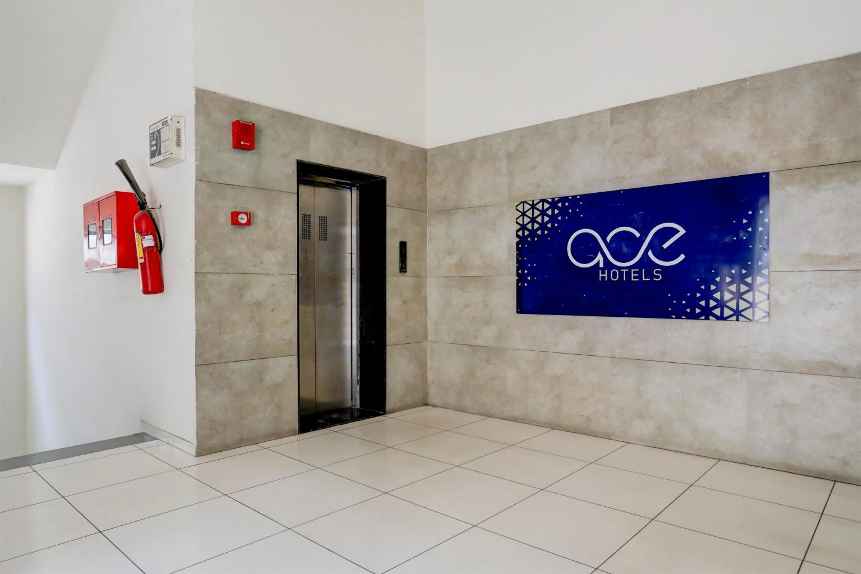 elevator in FabHotel Prime Ace II - Near Jupiter Hospital