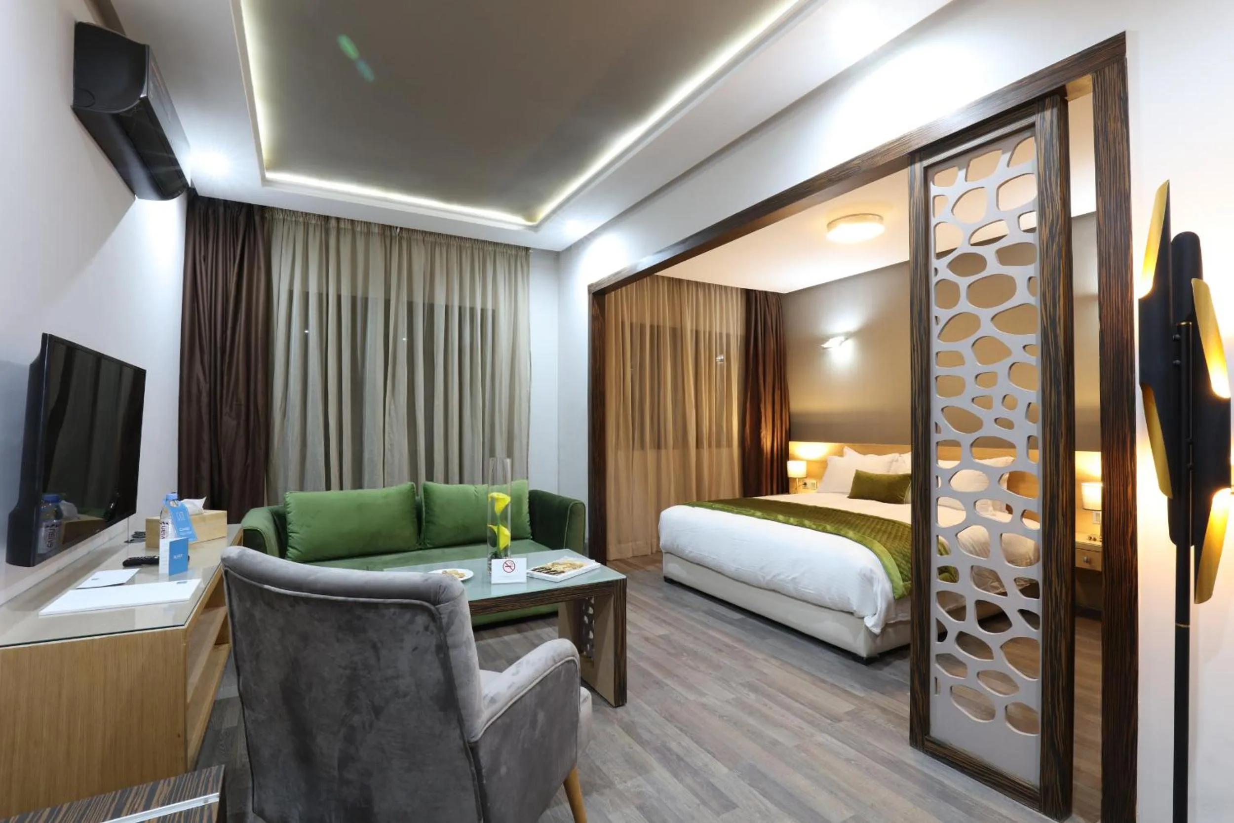 Communal lounge/ TV room, Bed in Silver Suites Hotel & Spa Casablanca