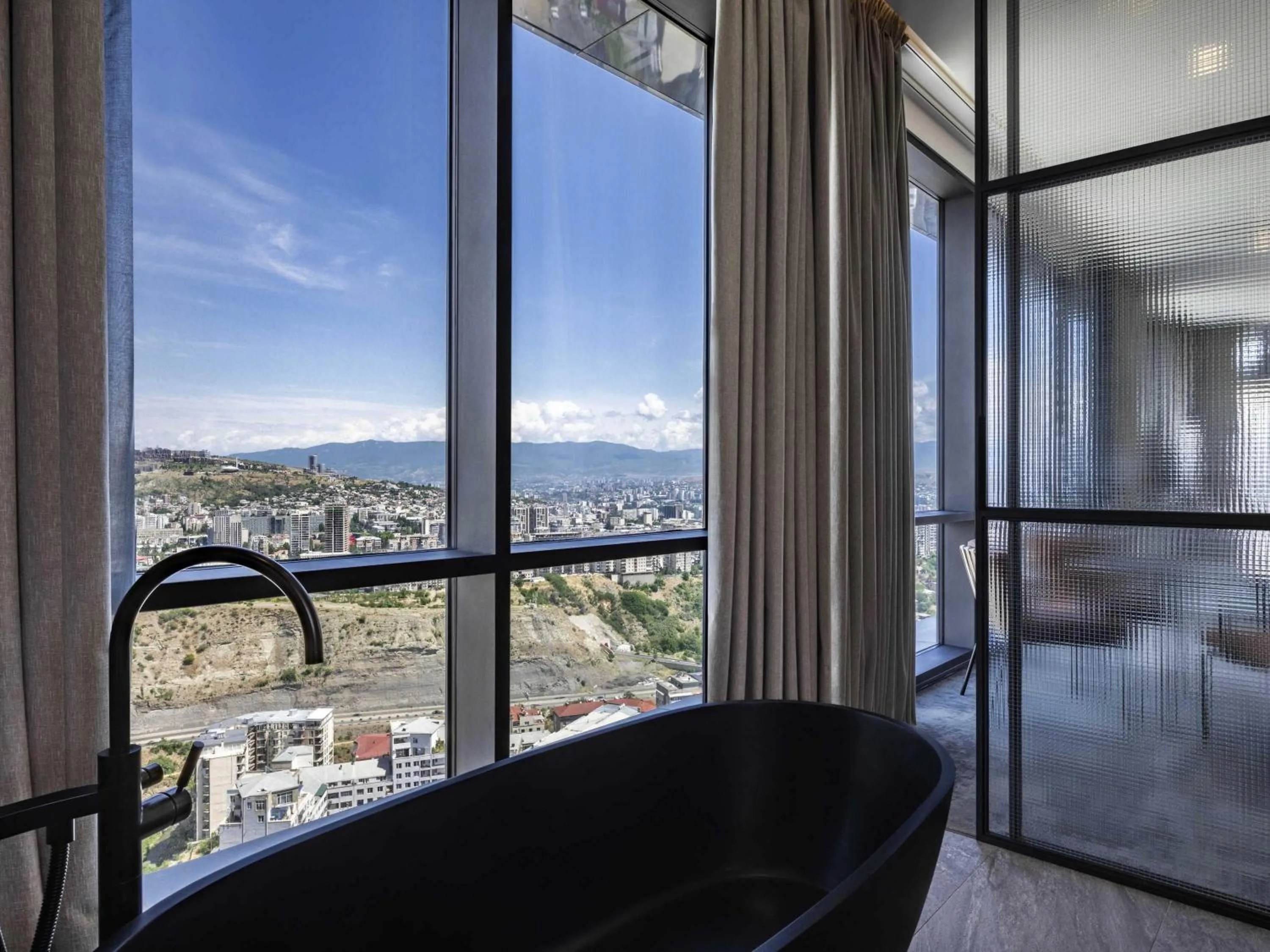 Bedroom in Pullman Tbilisi Axis Towers