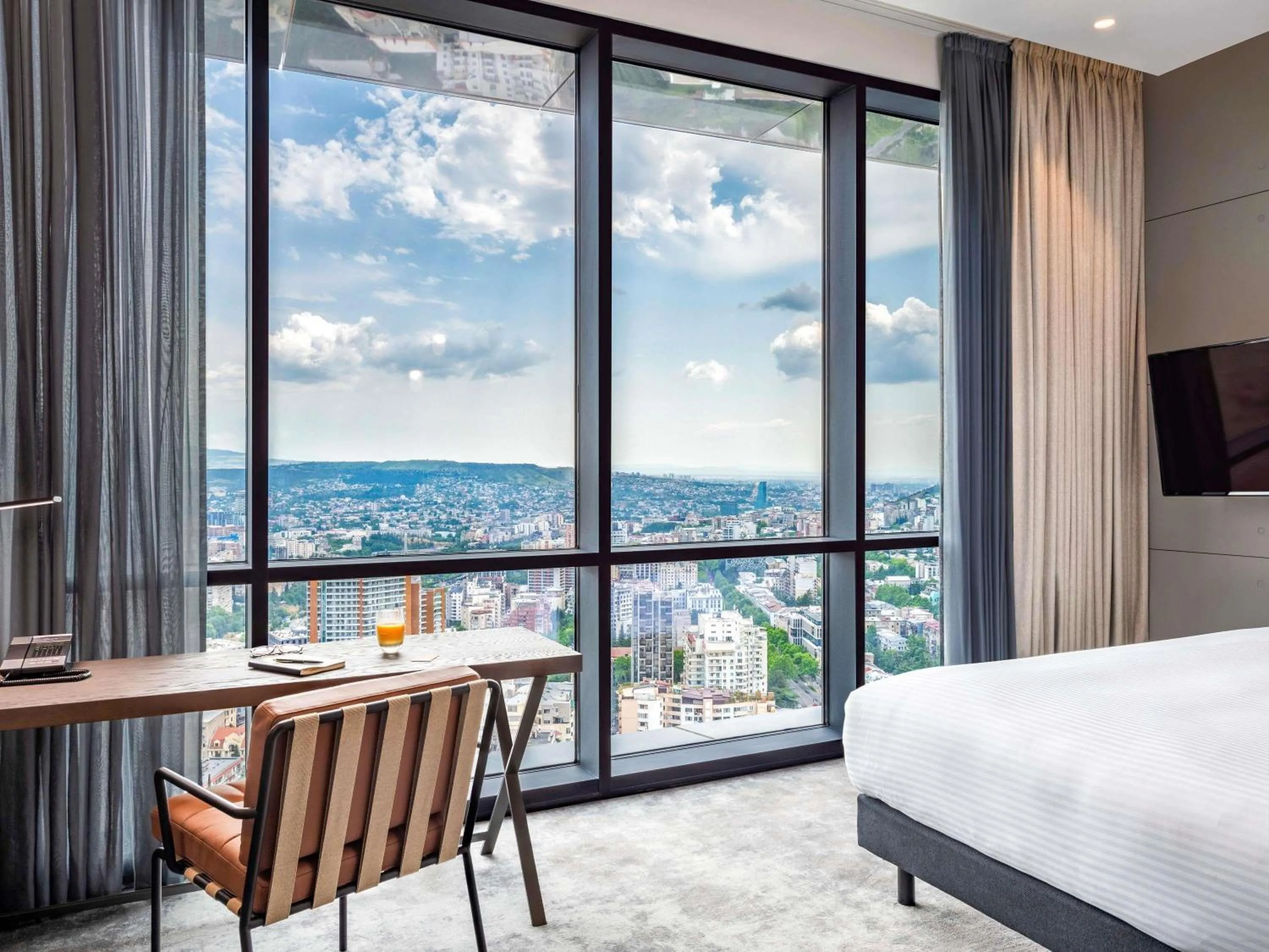 Property building, Bed in Pullman Tbilisi Axis Towers