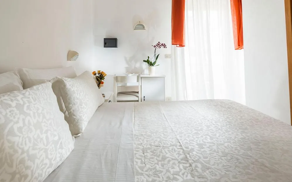 Bed in Hotel Capinera