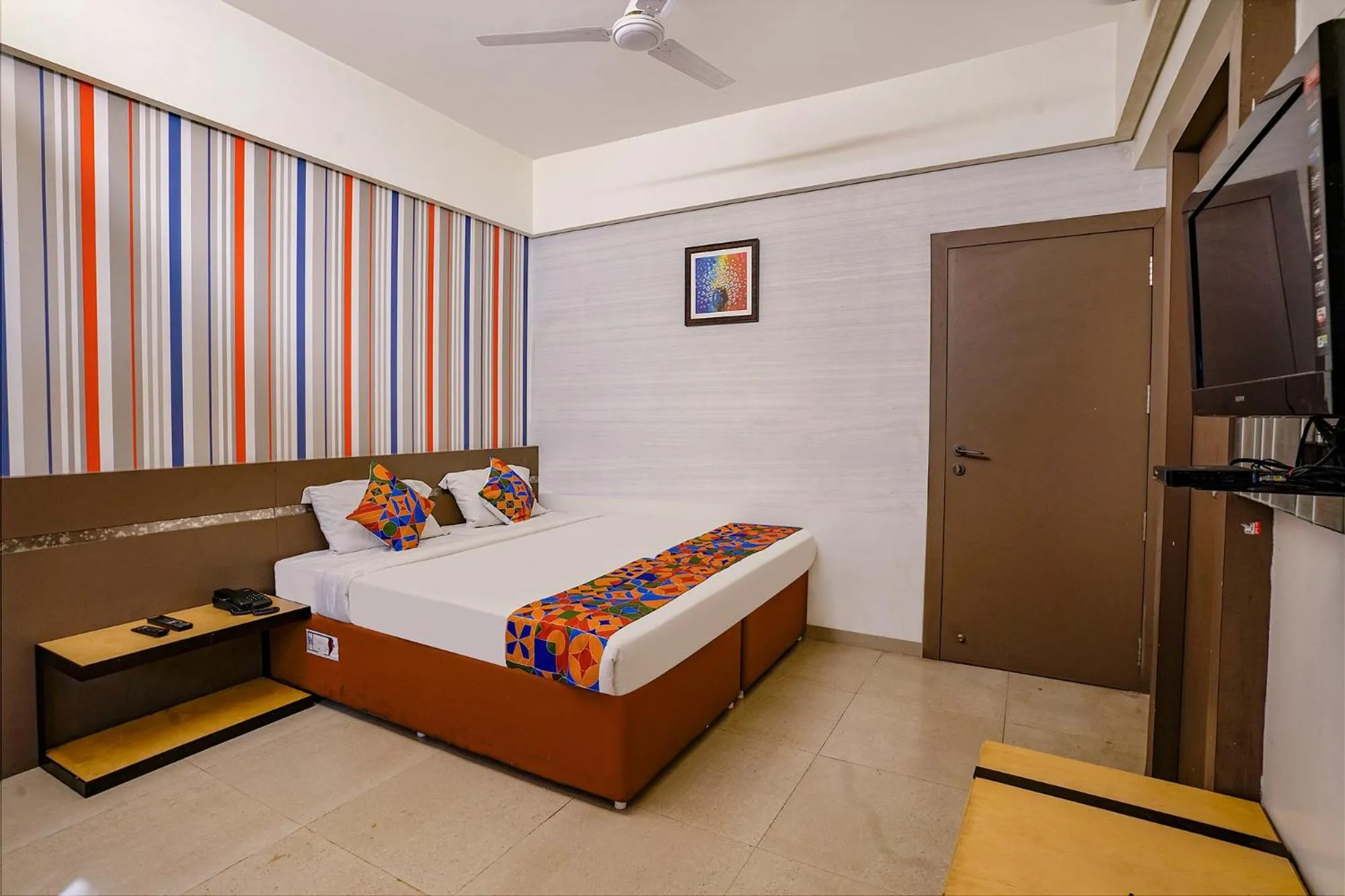 Bed in FabHotel Gargi Deluxe