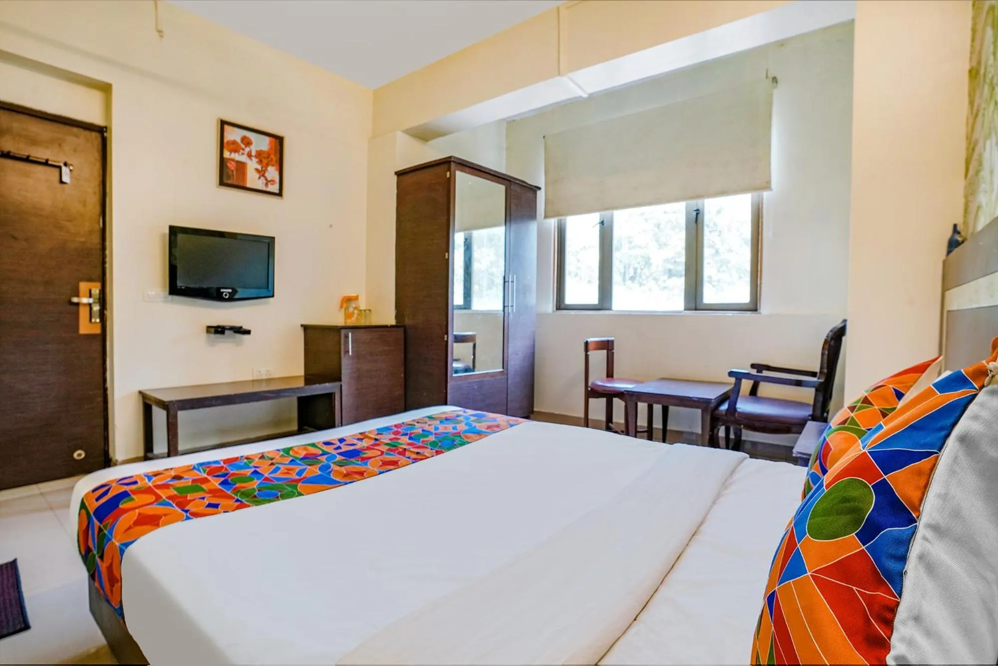 Bed in FabHotel Gargi Deluxe