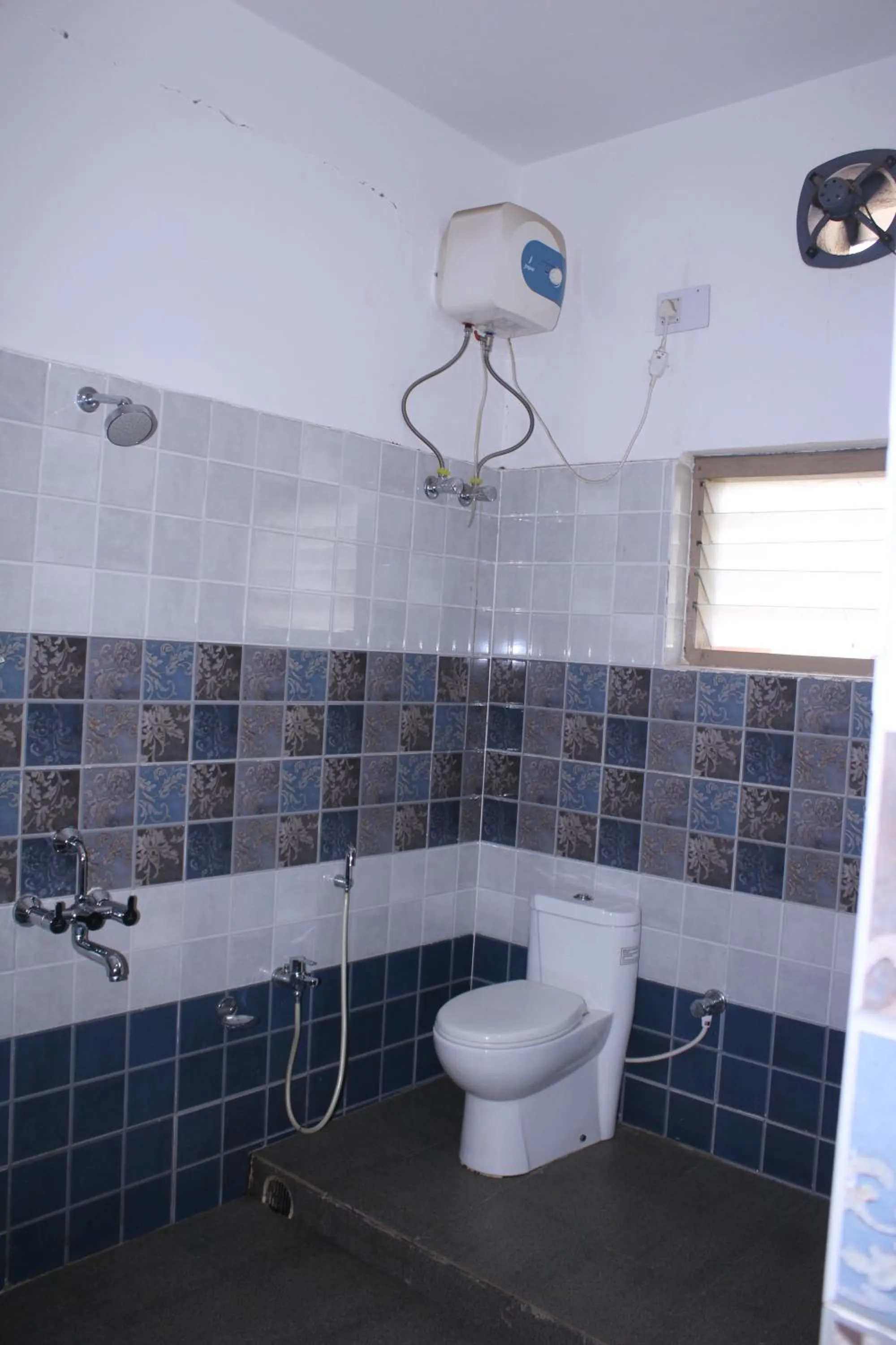 Shower in CHETAN INN HOTEL