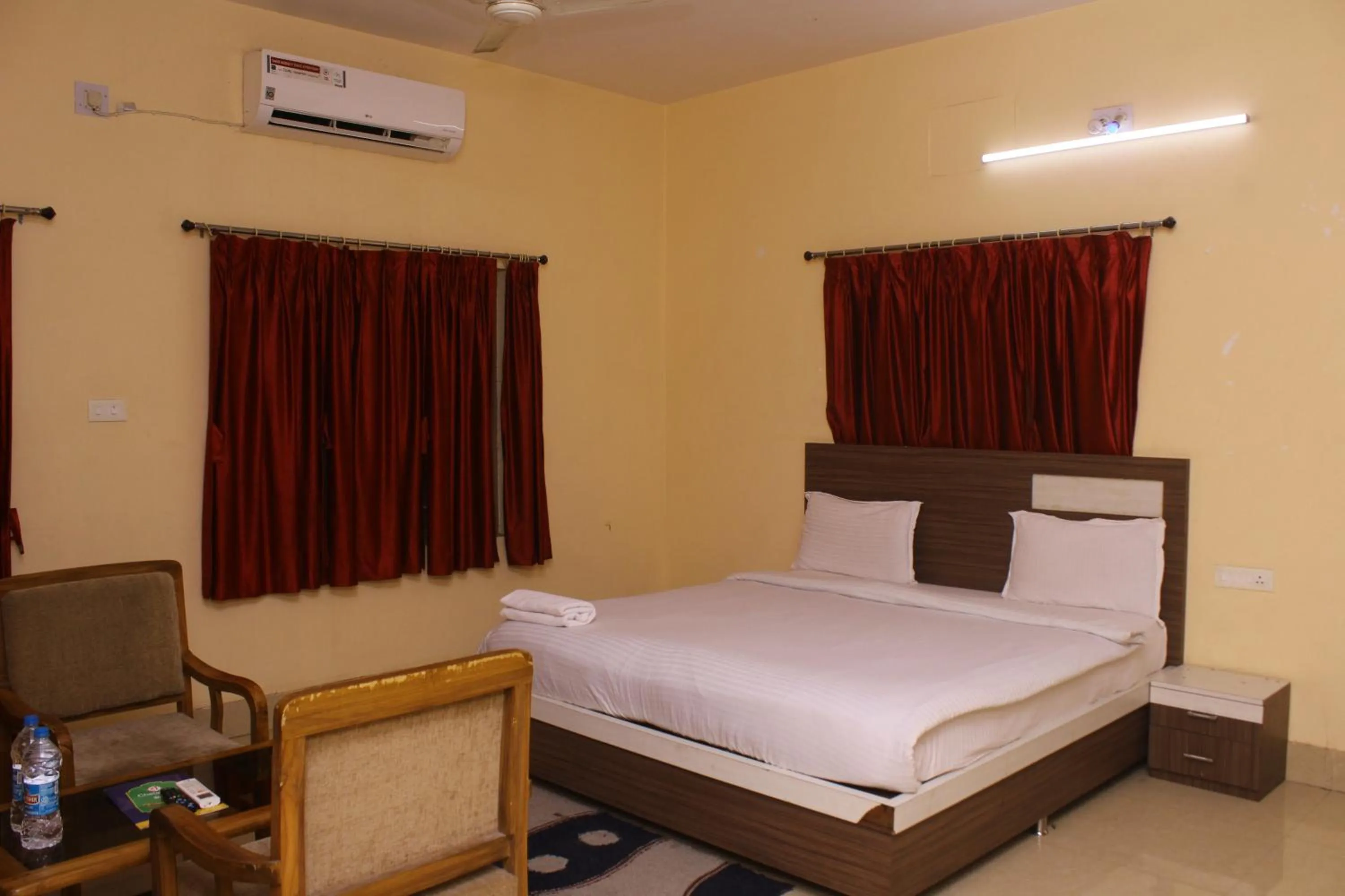 Bed in CHETAN INN HOTEL