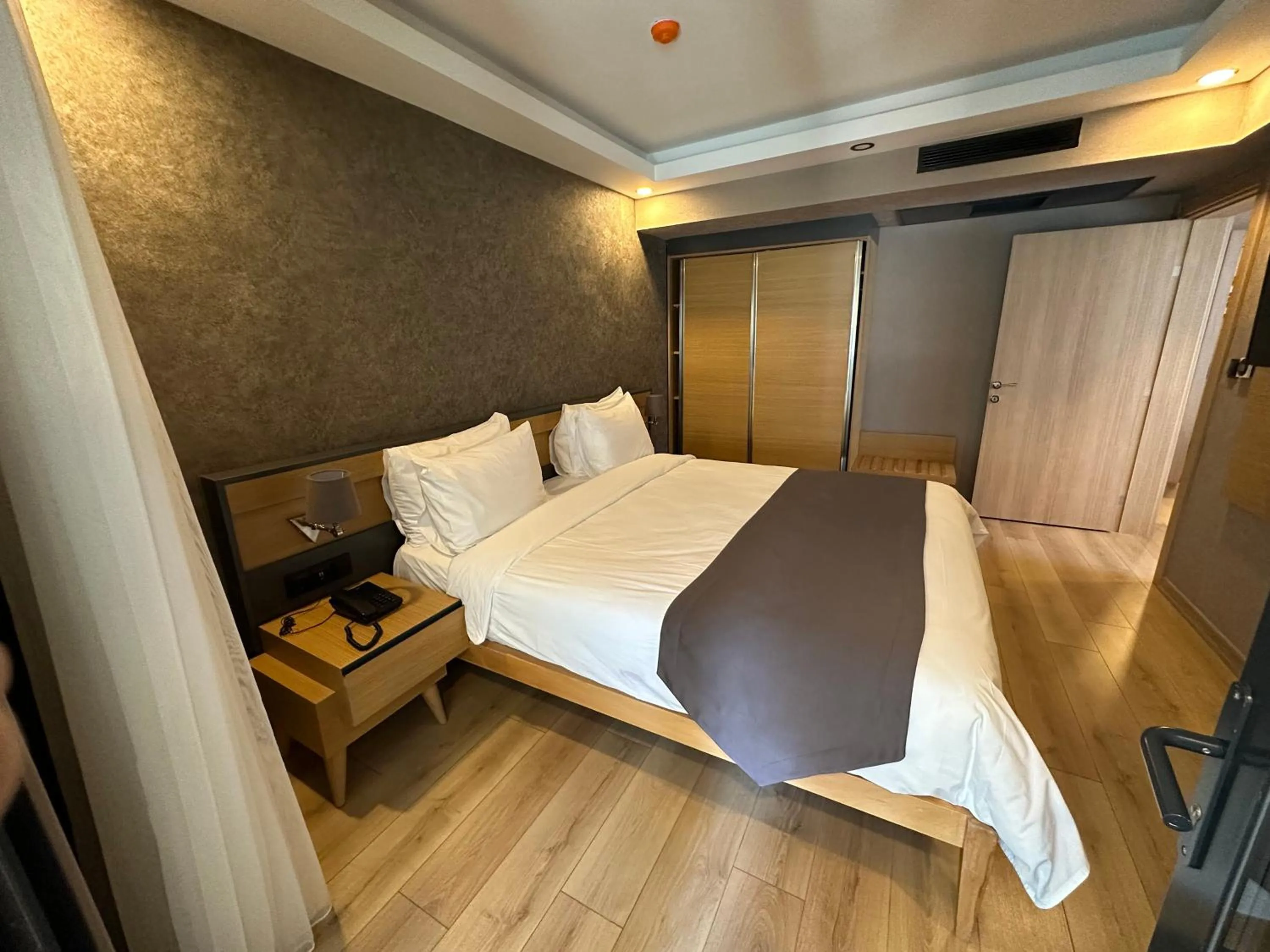 Bed in Şehrar Suite Hotel