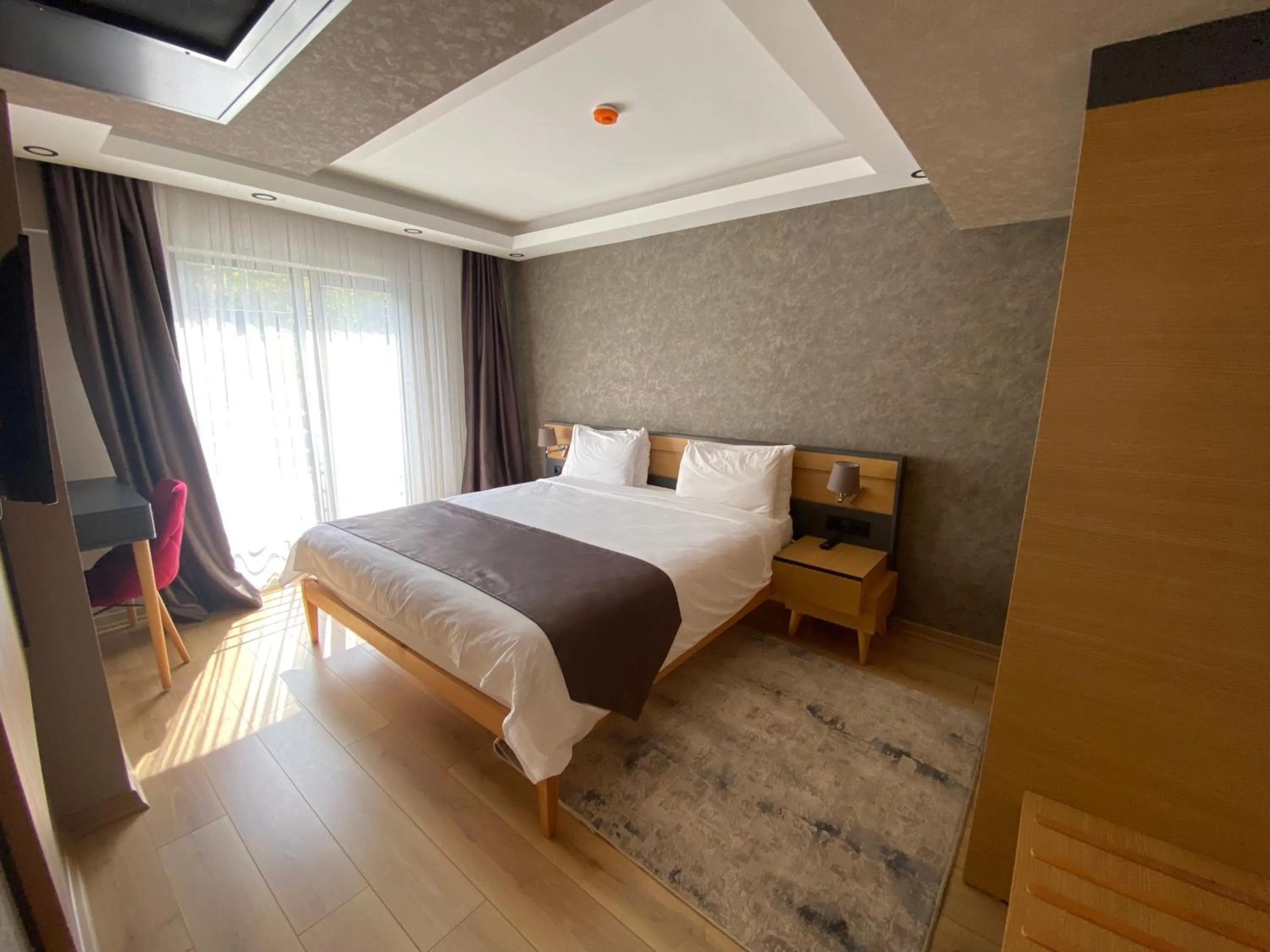 Bed in Şehrar Suite Hotel