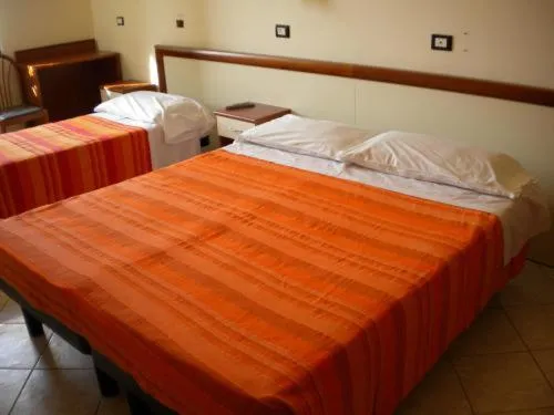 Bed in Serafino Liguria Hotel