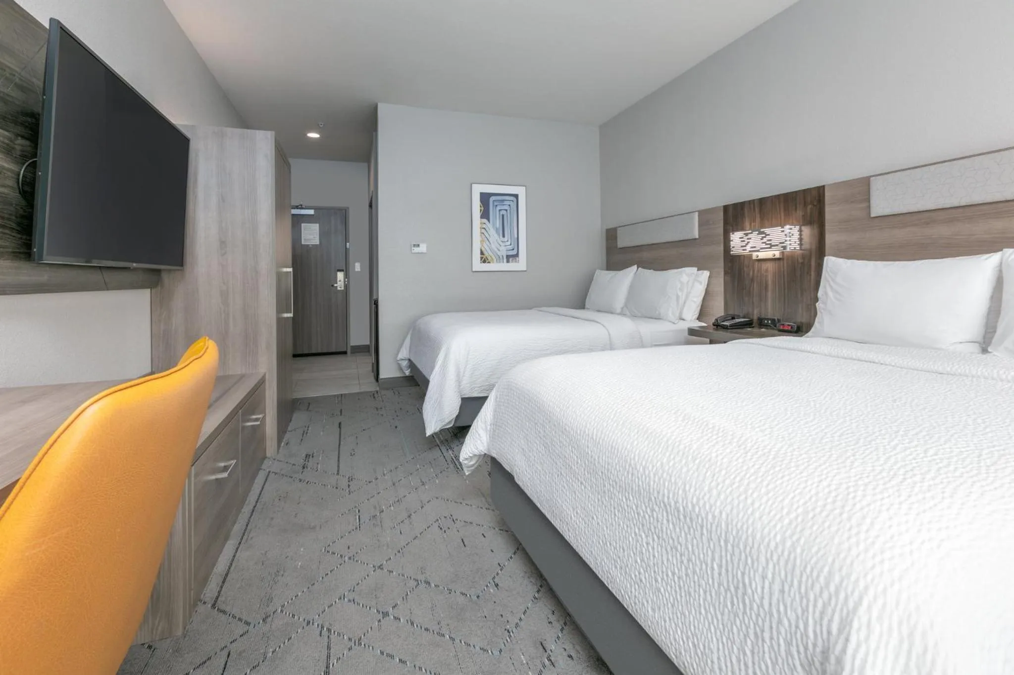 Photo of the whole room, Bed in HOLIDAY INN EXPRESS & SUITES DALLAS PLANO NORTH by IHG