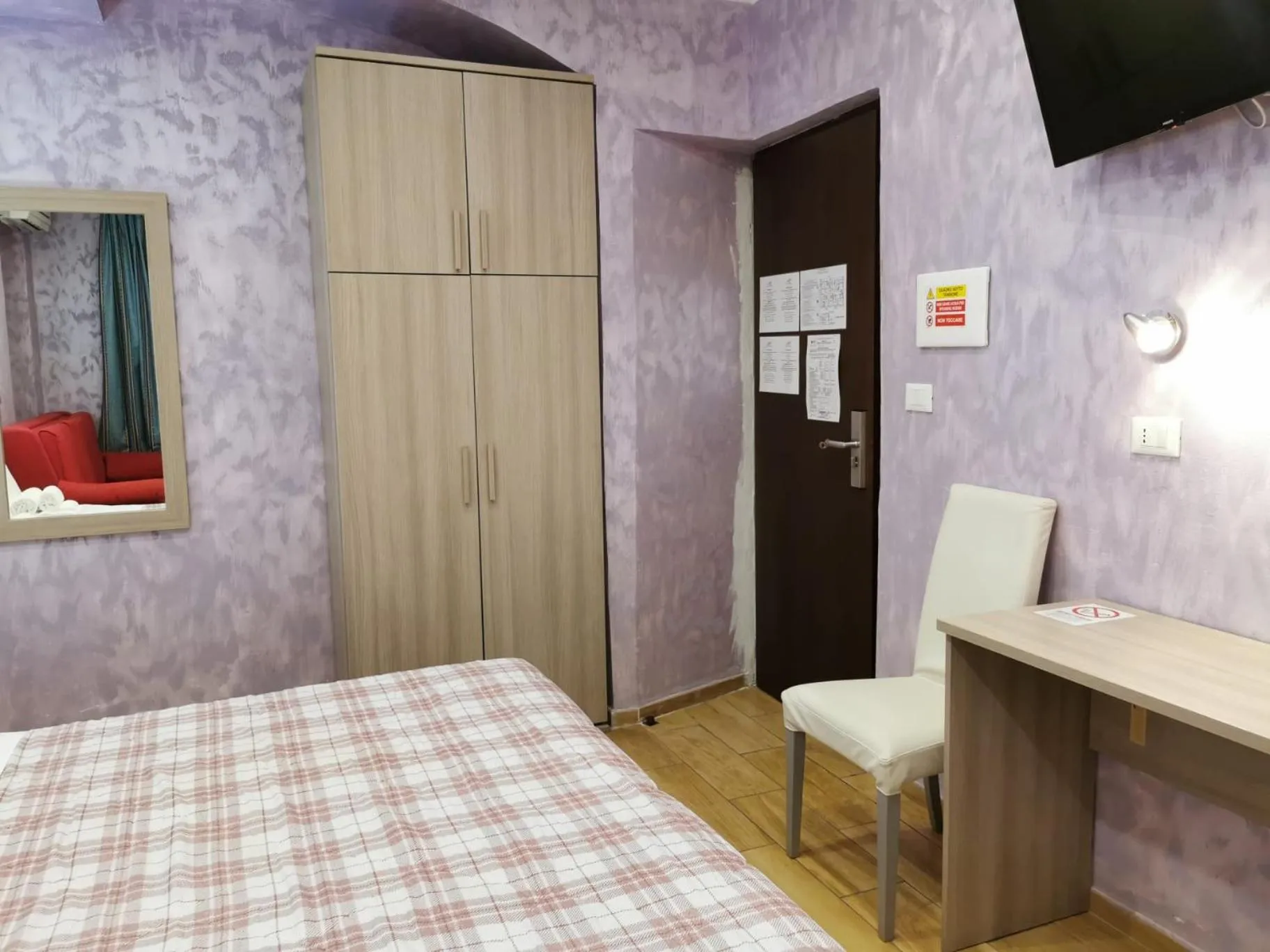 Bed in Hotel Orchidea