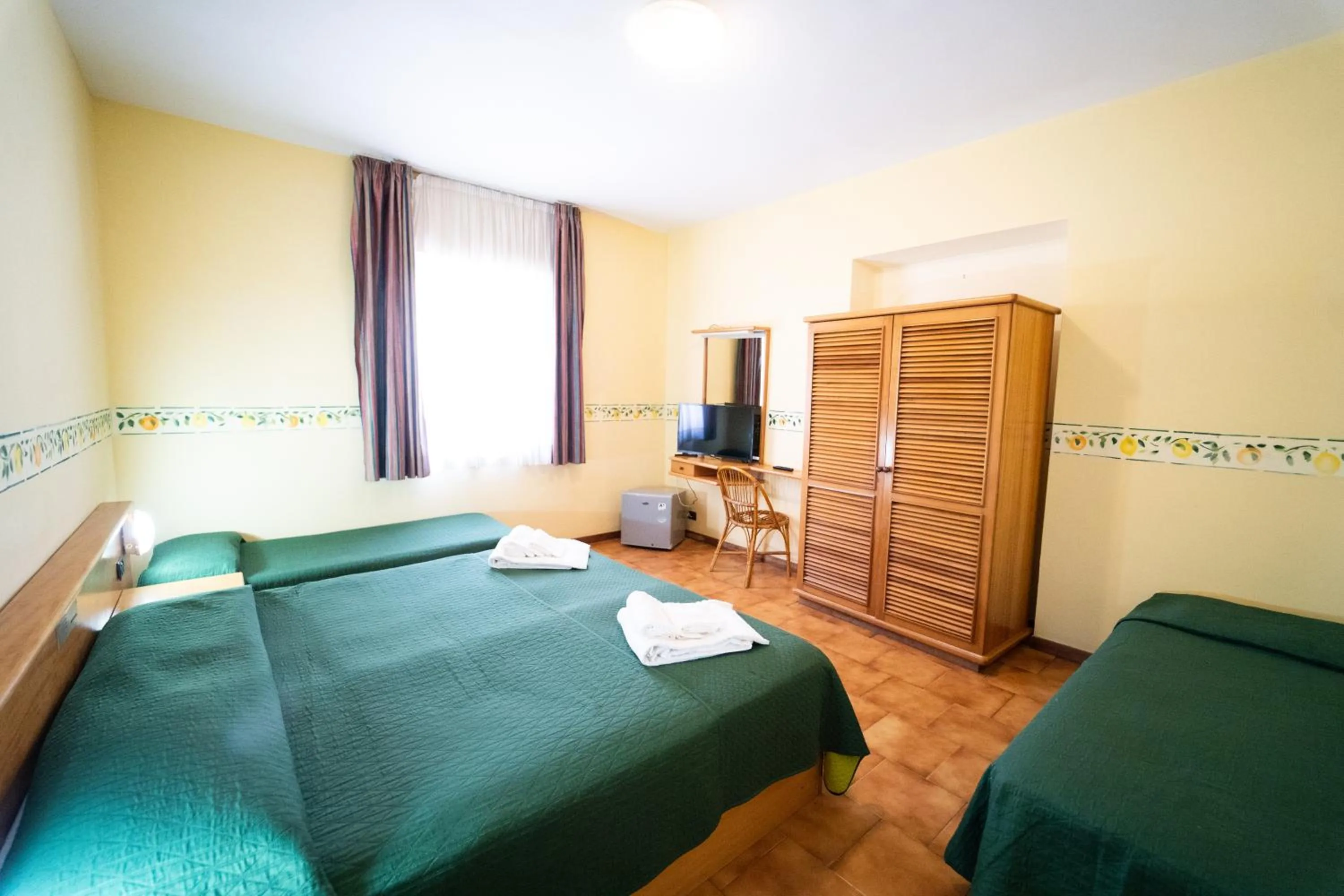 Bed in Hotel San Pietro