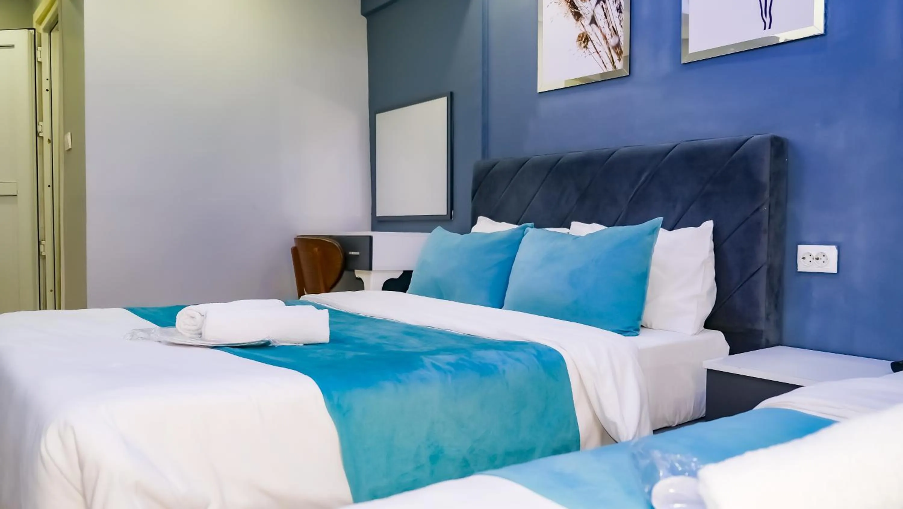 Bed in Bona Sera Hotel