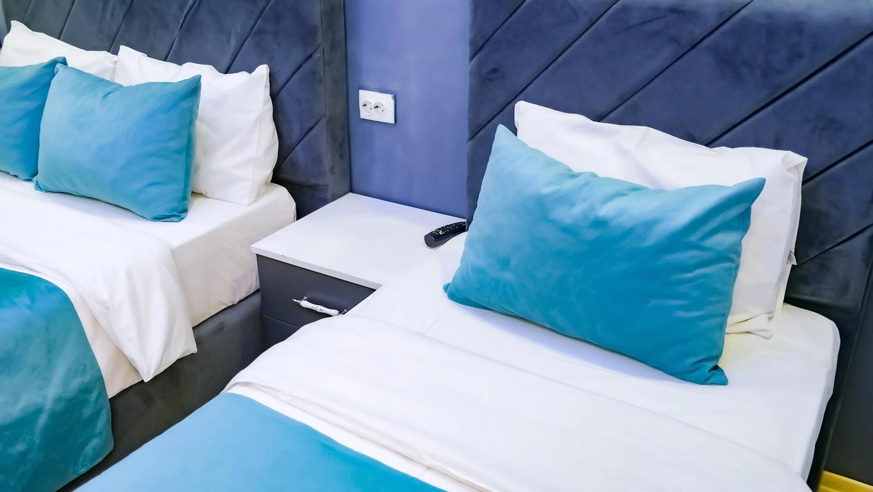 Bed in Bona Sera Hotel