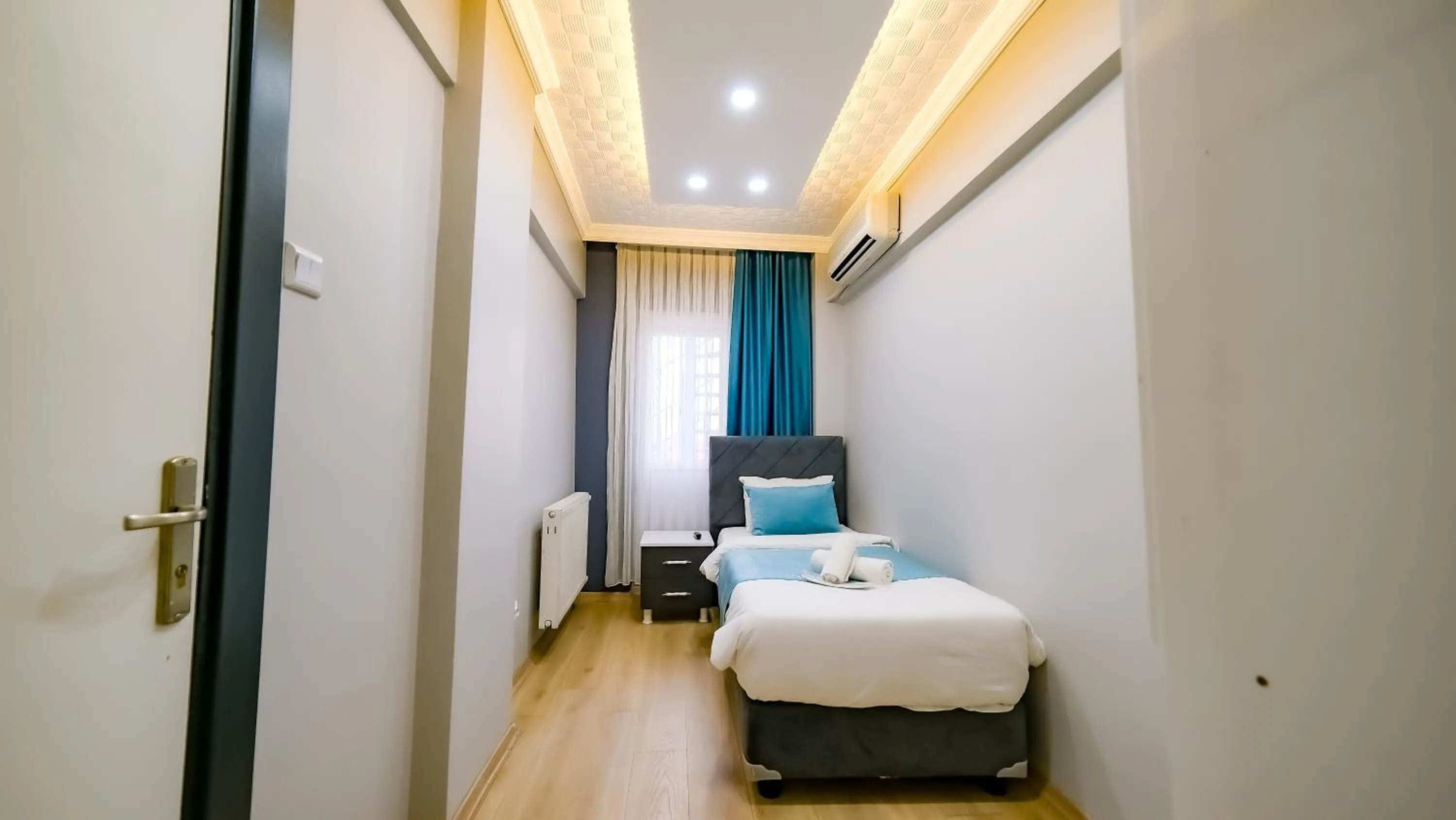 Bed in Bona Sera Hotel