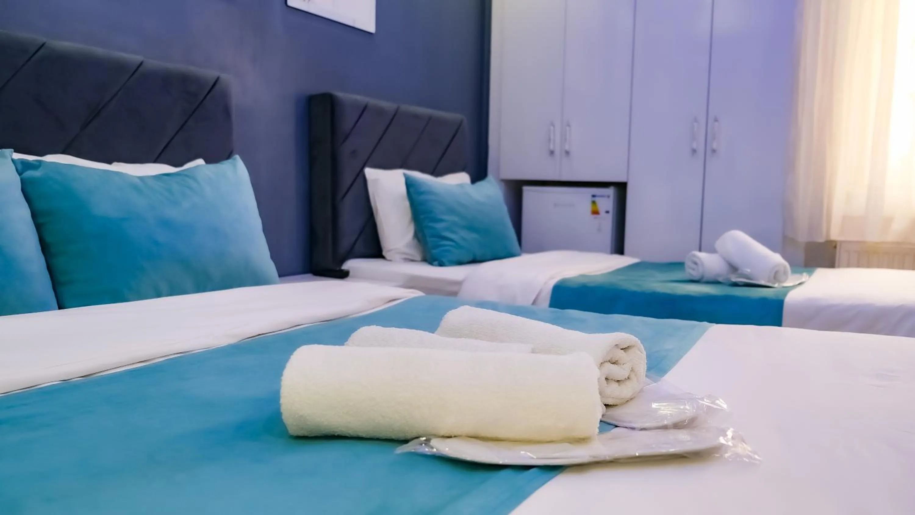 Bed in Bona Sera Hotel