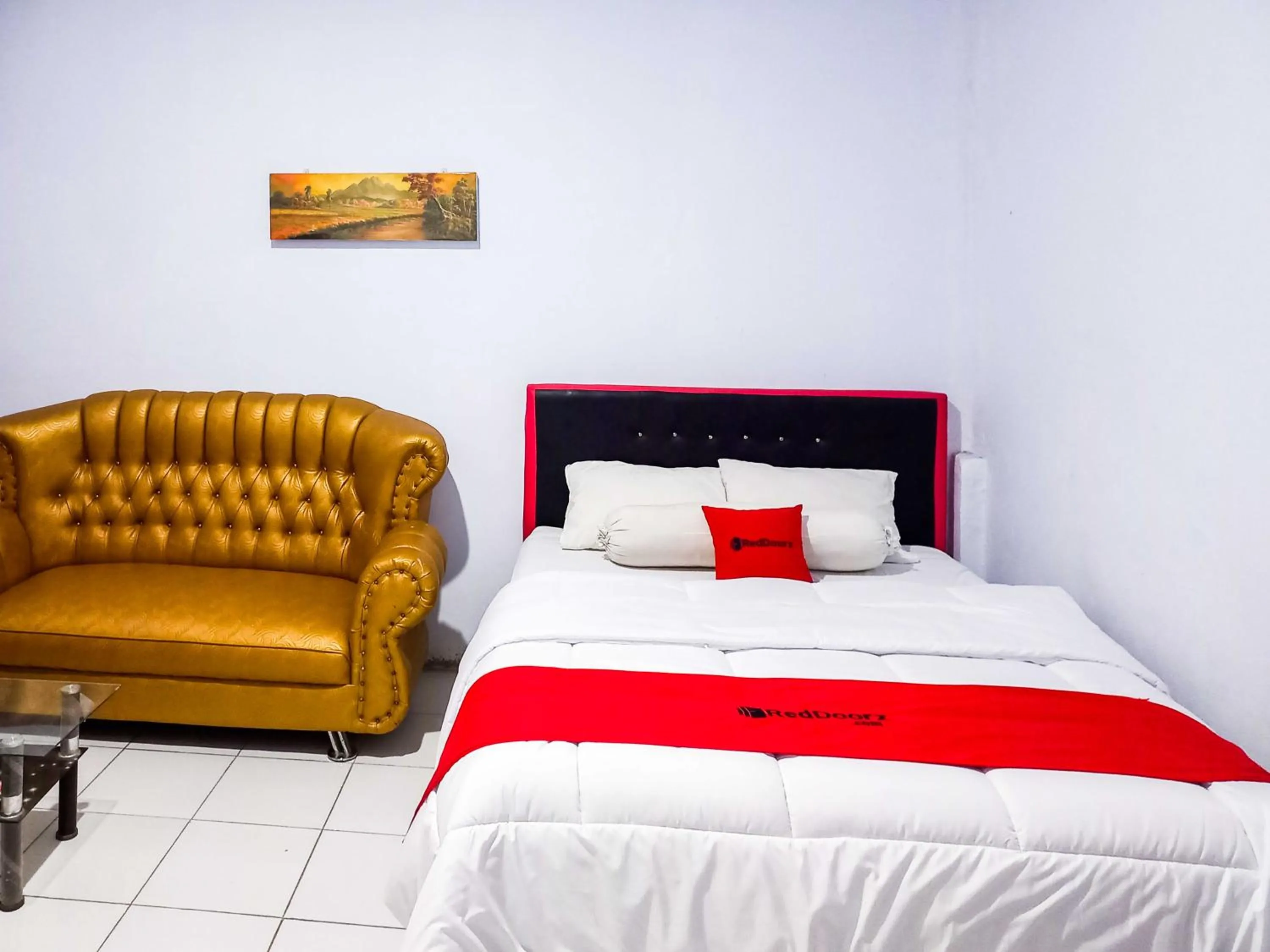 Bed in RedDoorz @ Lolak Bolaang Mongondow