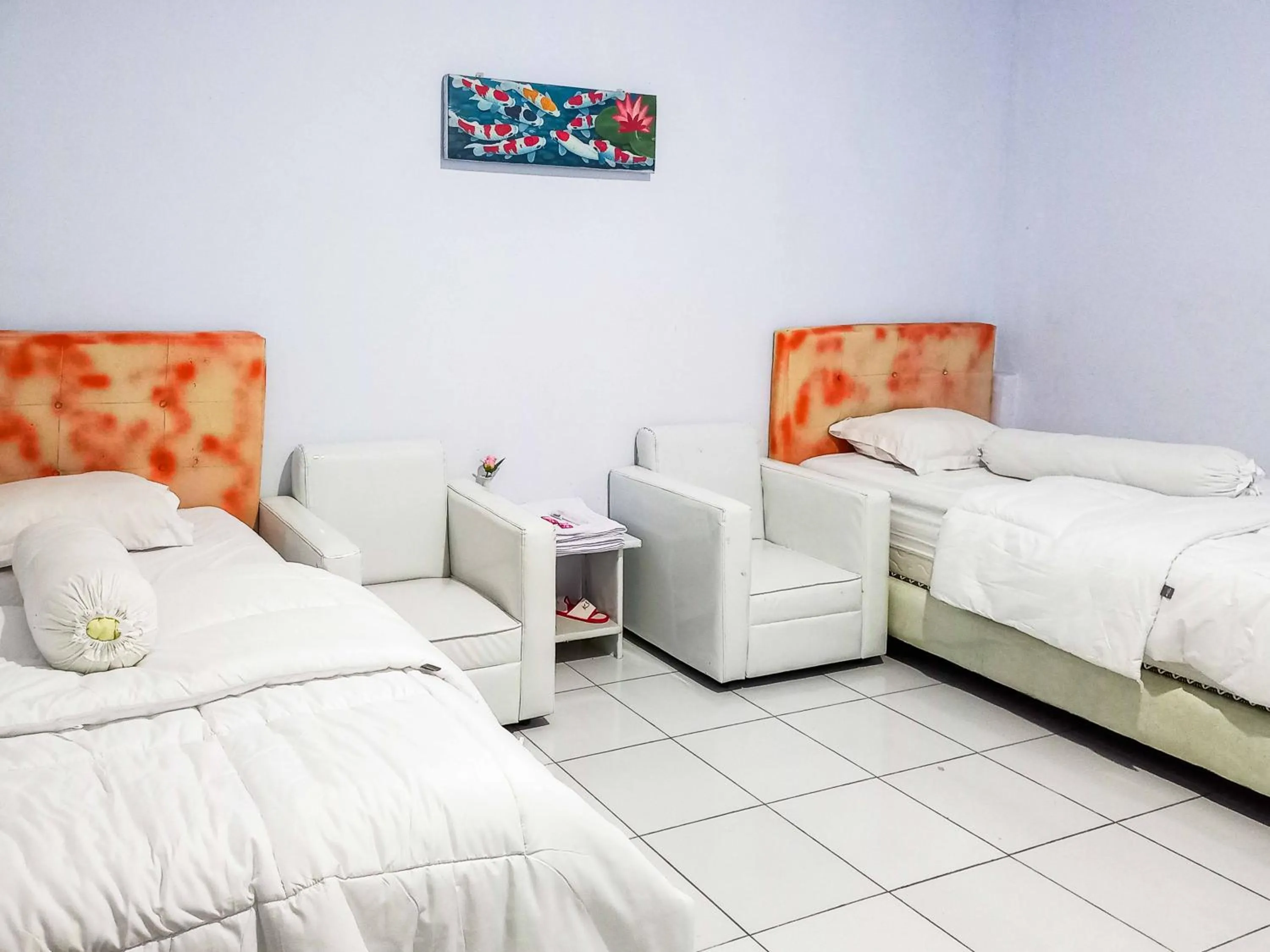 Bed in RedDoorz @ Lolak Bolaang Mongondow