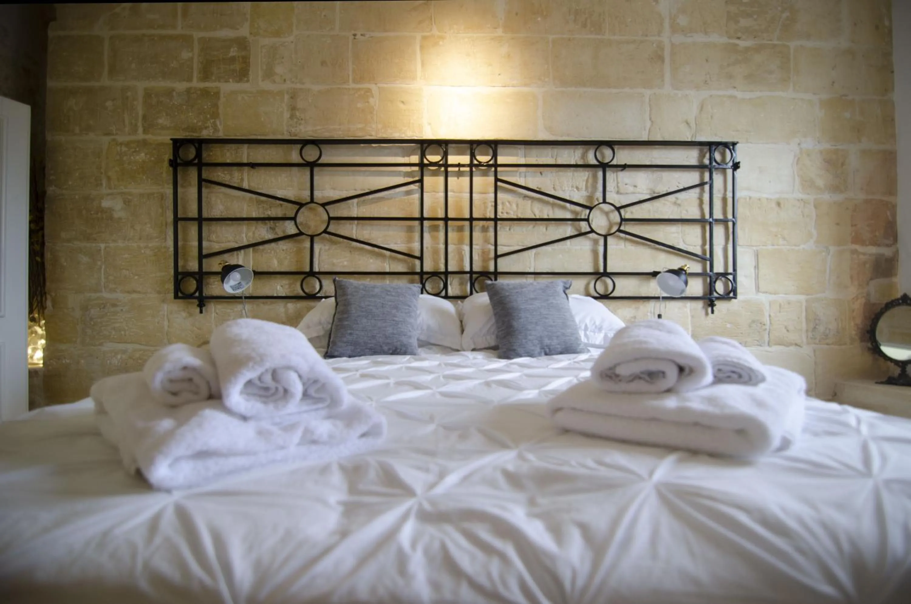Bed in Senglea Suites