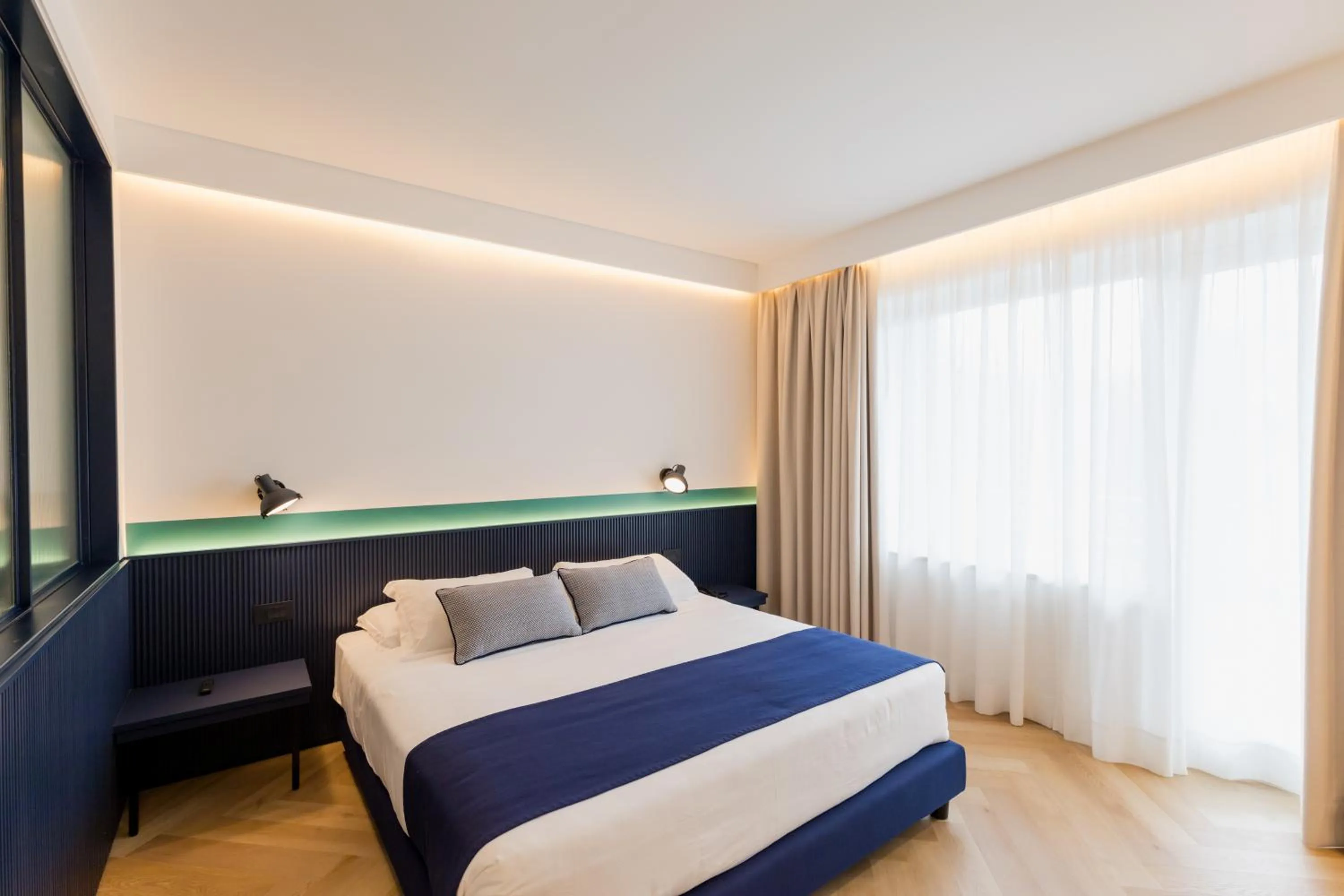 Bed in Grand Hotel Cesare Augusto