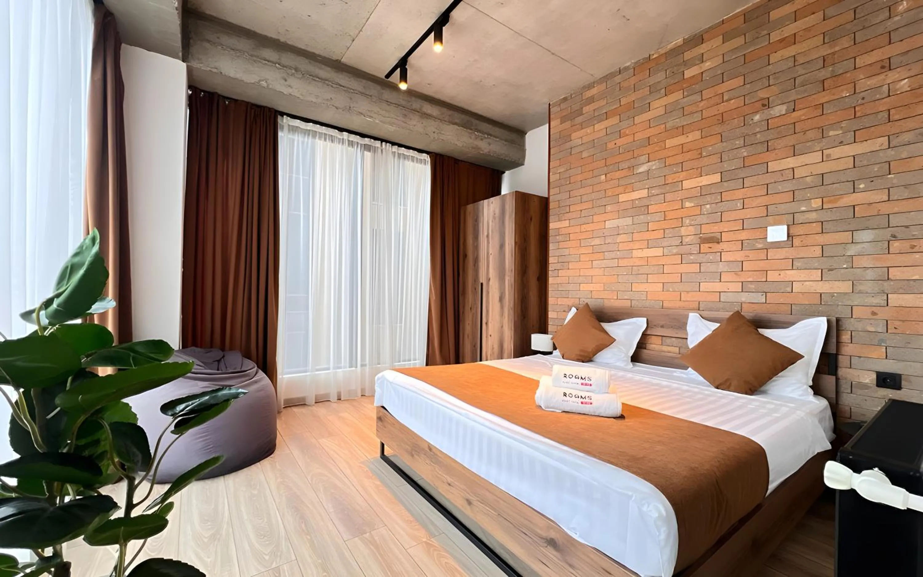 Bed in Rooms Apart Hotel by RED