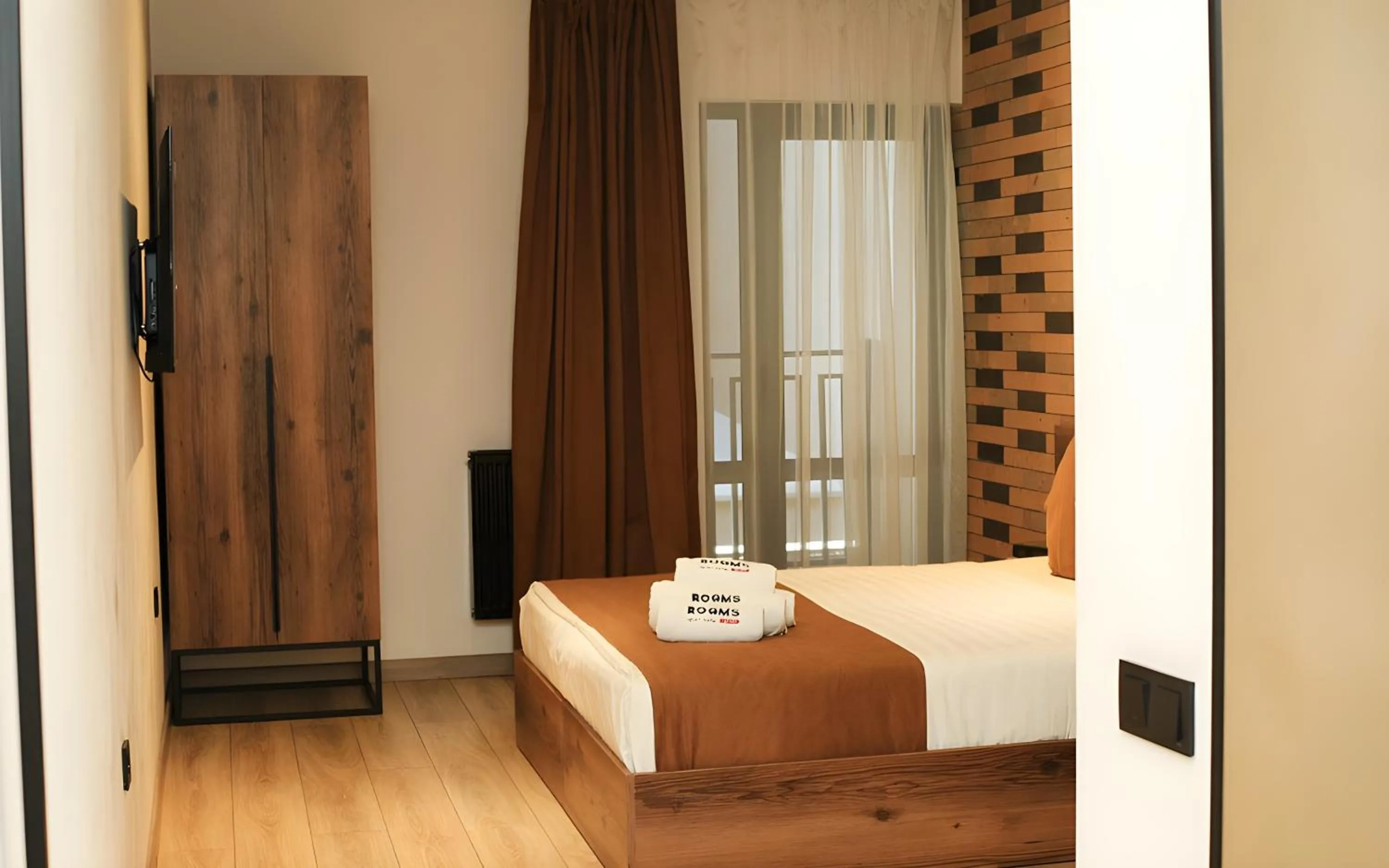 Bed in Rooms Apart Hotel by RED