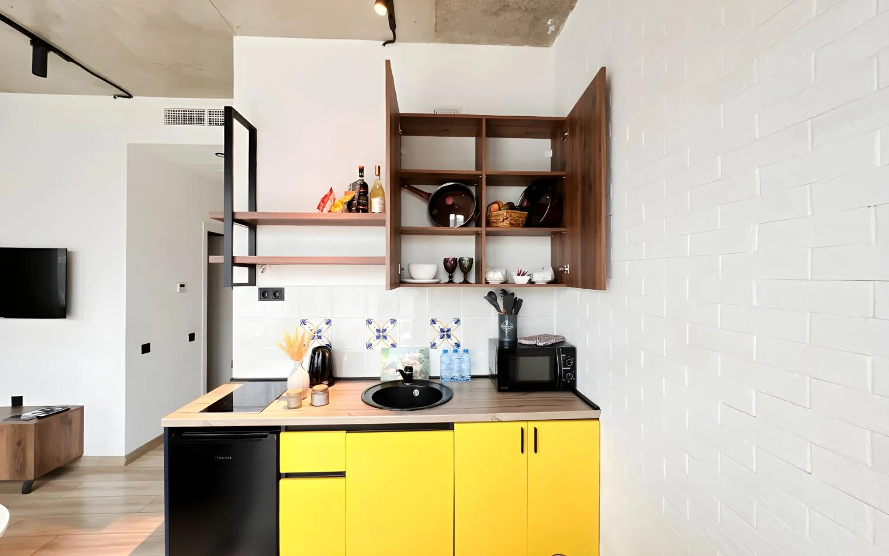 Kitchen or kitchenette in Rooms Apart Hotel by RED