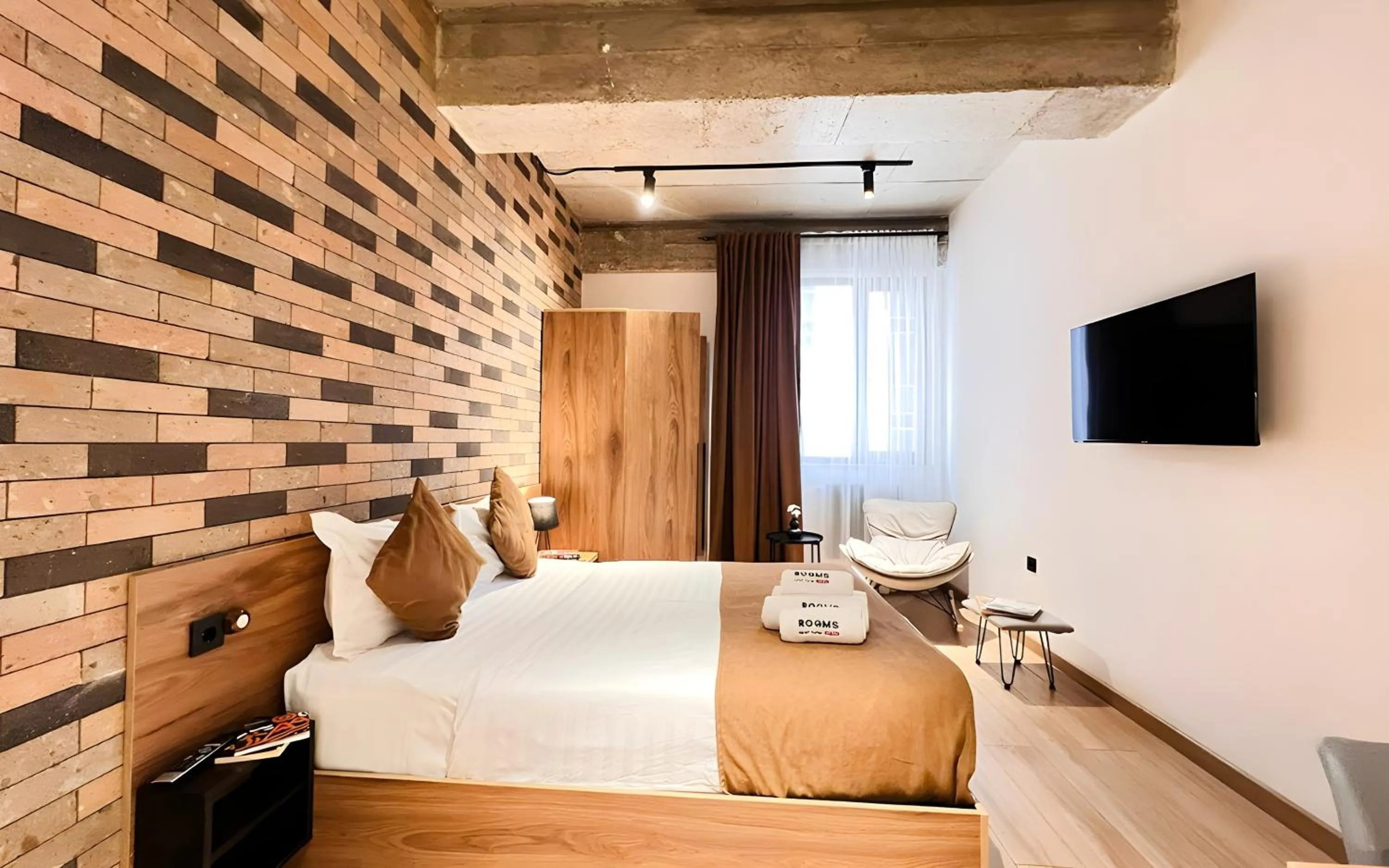 Bed in Rooms Apart Hotel by RED