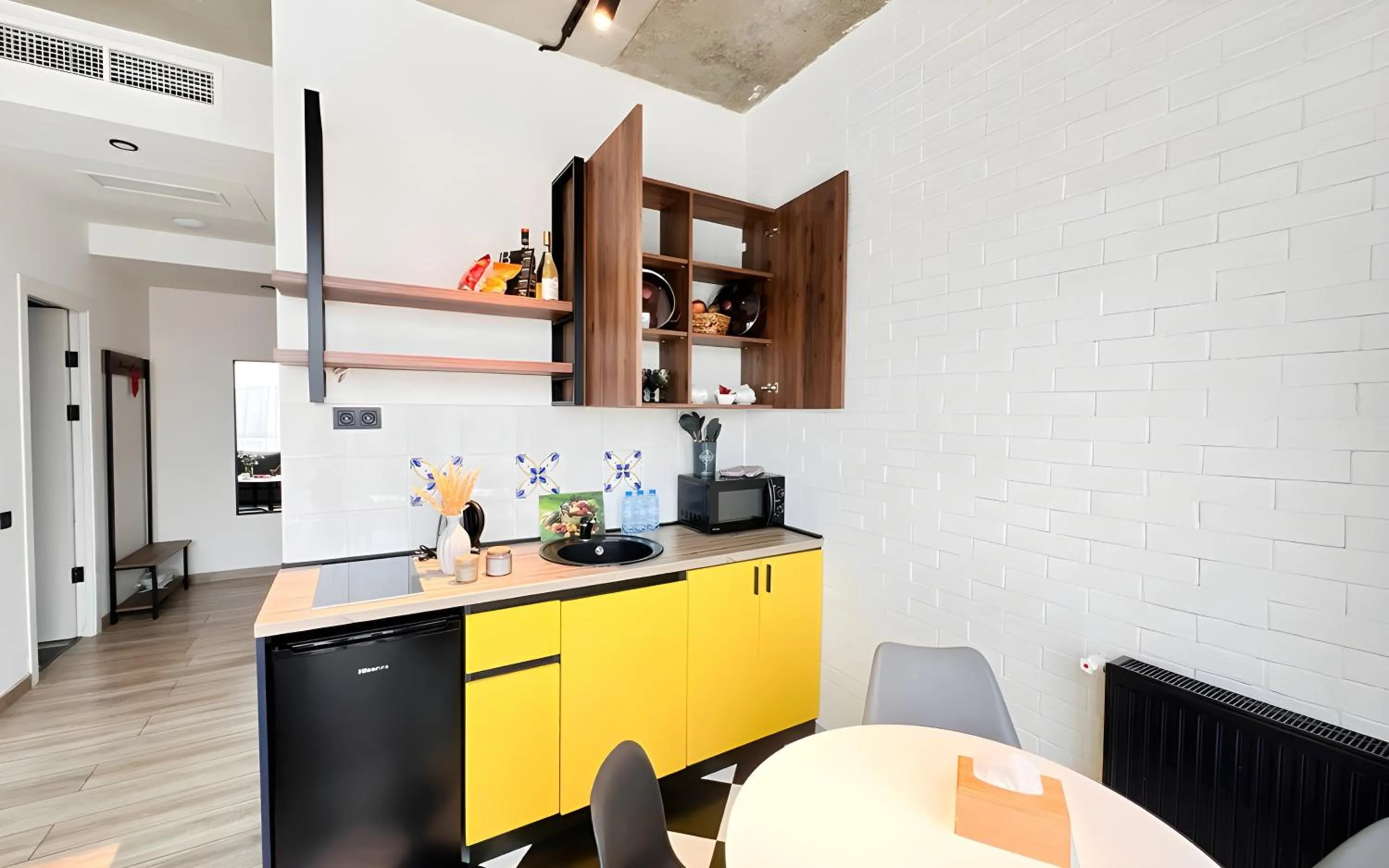 Kitchen or kitchenette in Rooms Apart Hotel by RED