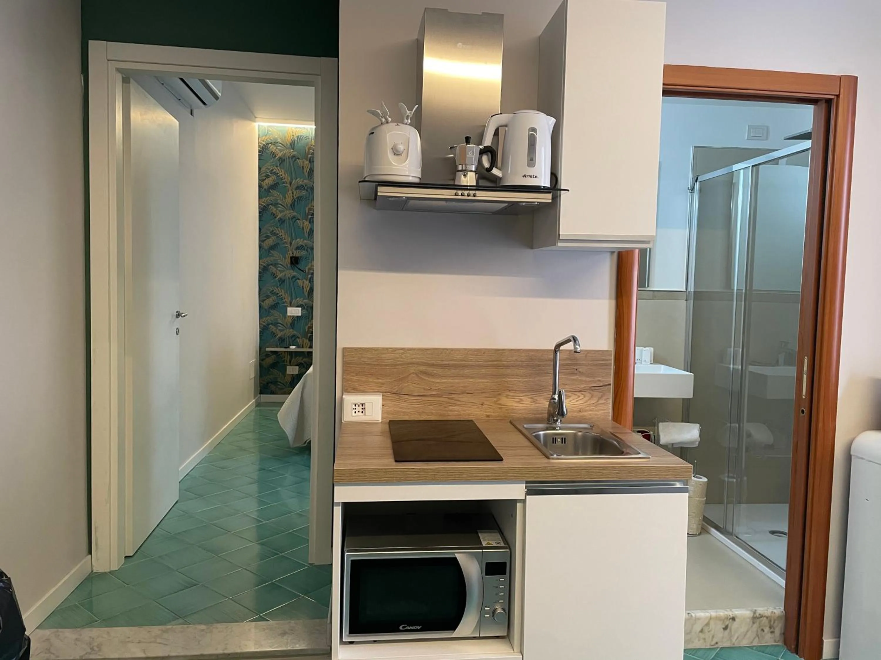 Kitchen or kitchenette in GiGa MaRe Apartments