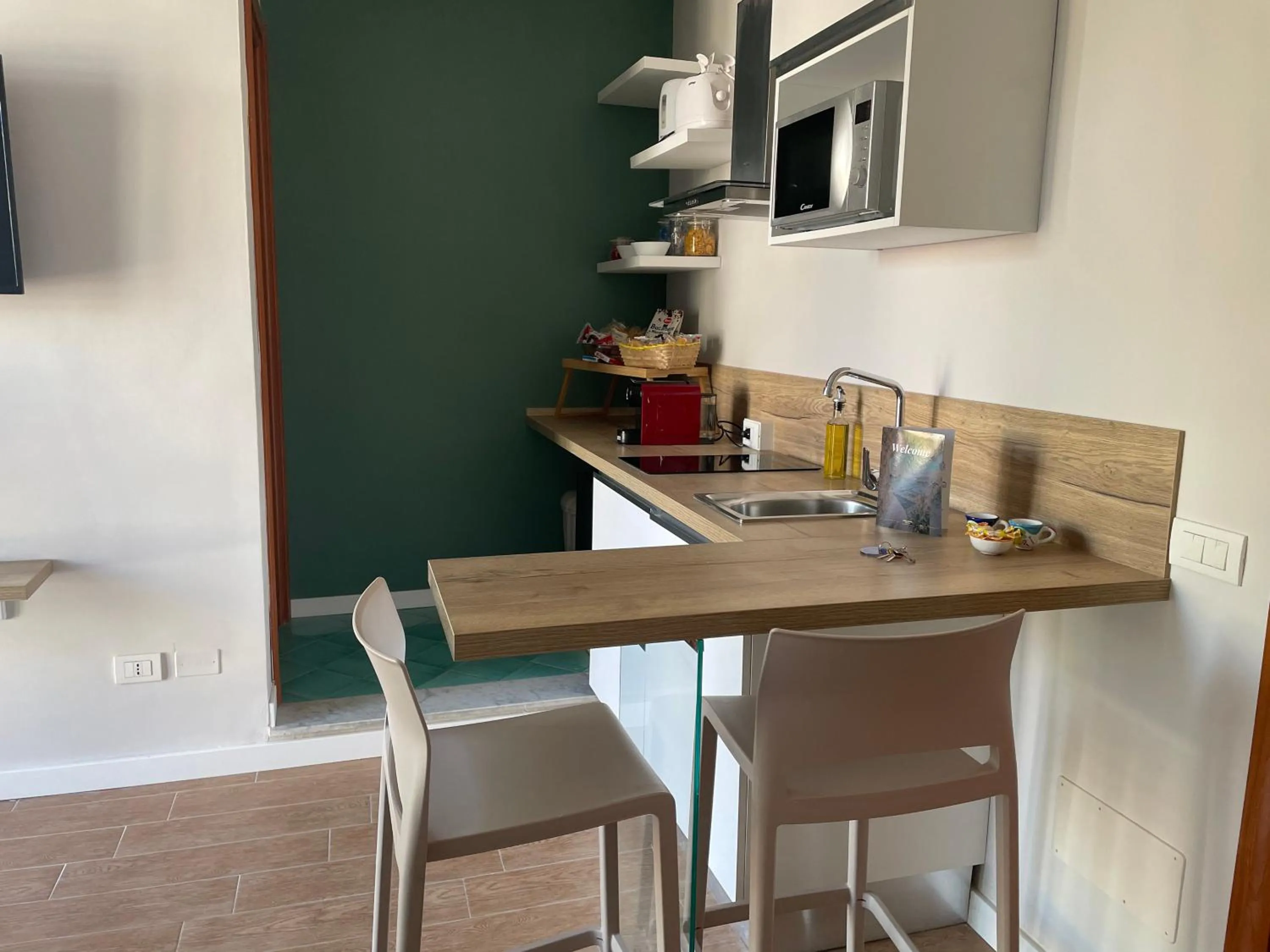 Kitchen or kitchenette in GiGa MaRe Apartments