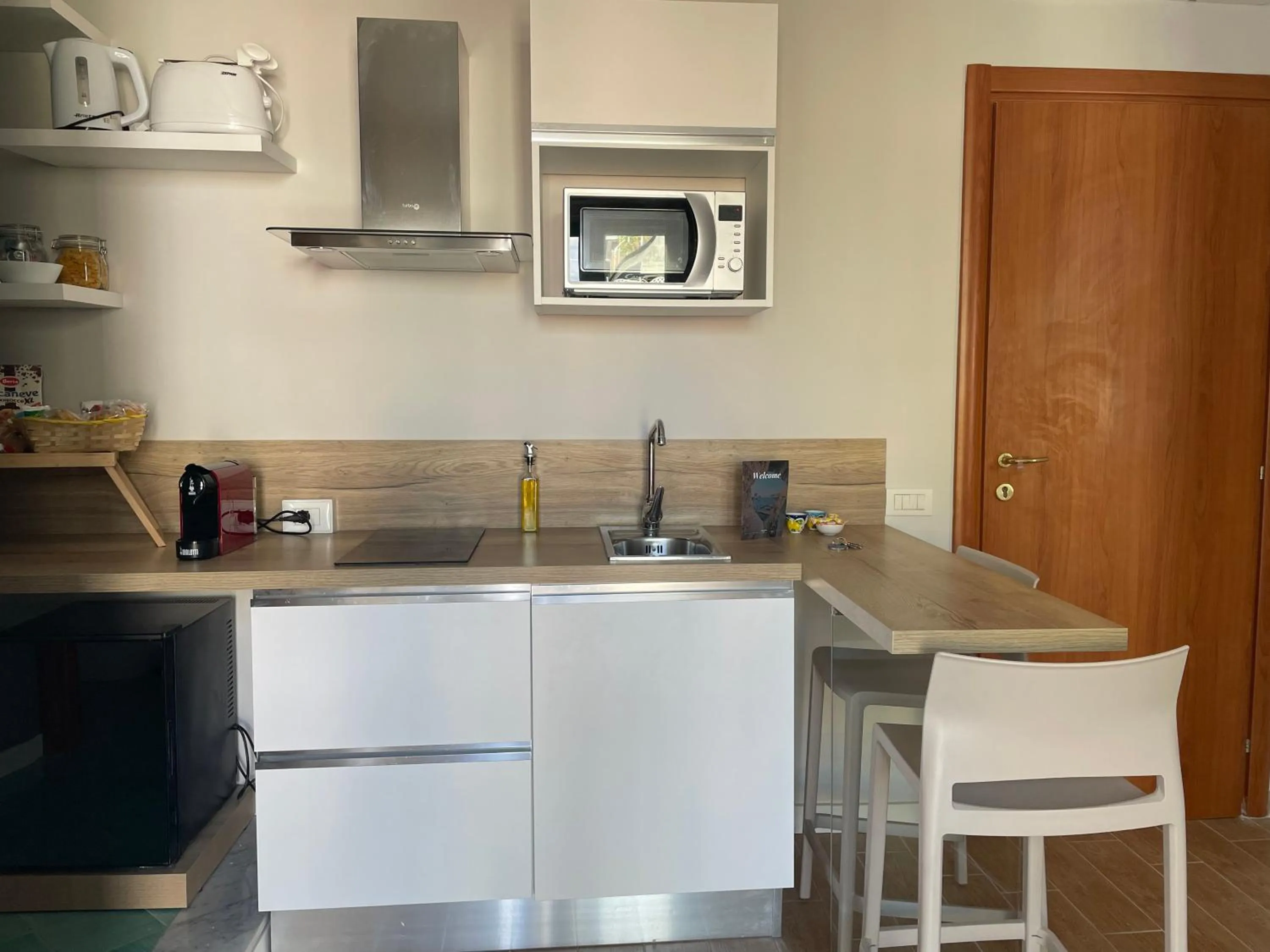 Kitchen or kitchenette in GiGa MaRe Apartments