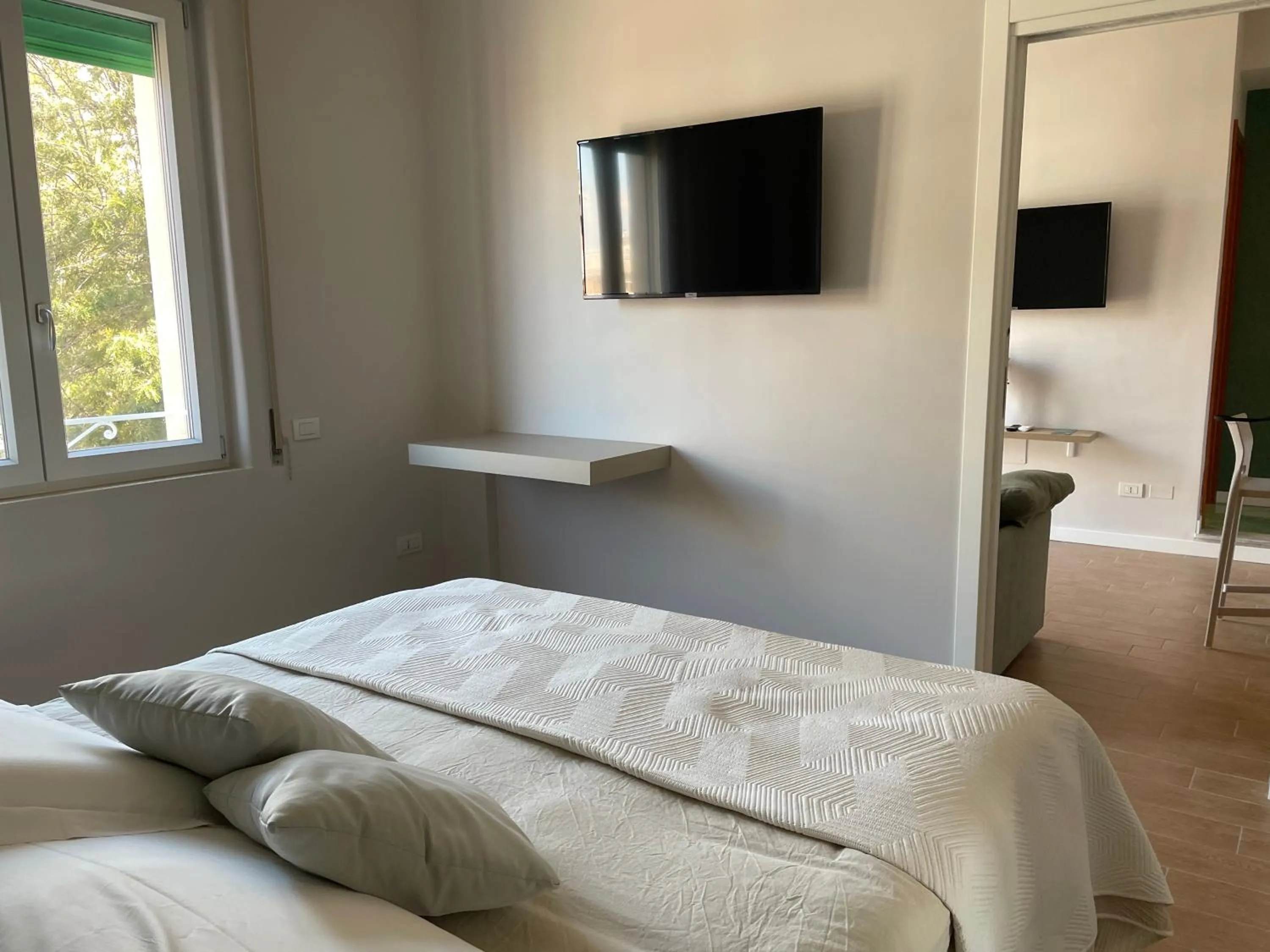 Bed in GiGa MaRe Apartments