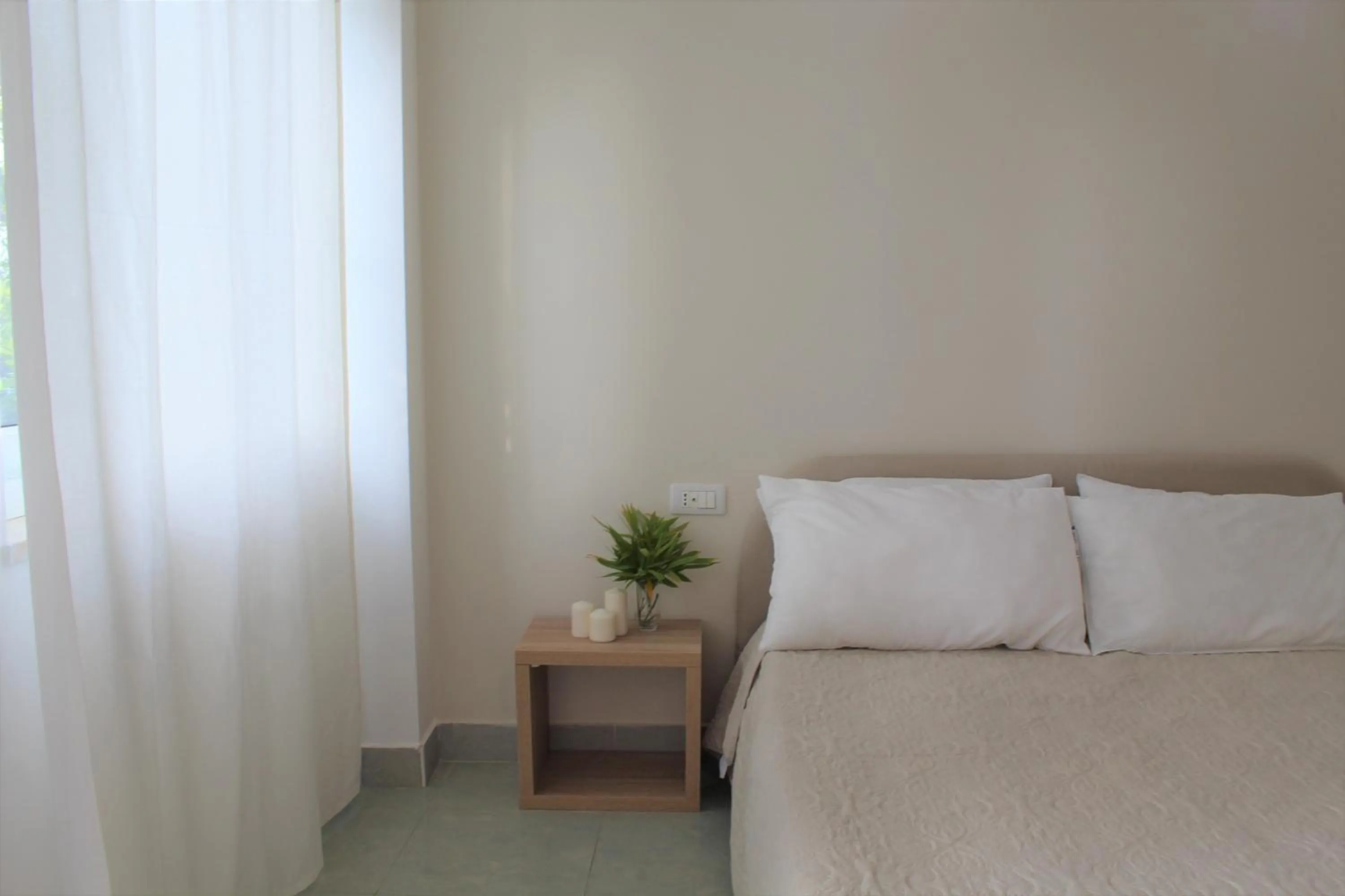 Decorative detail, Bed in Hotel - Giardino Marchese D'Altavilla