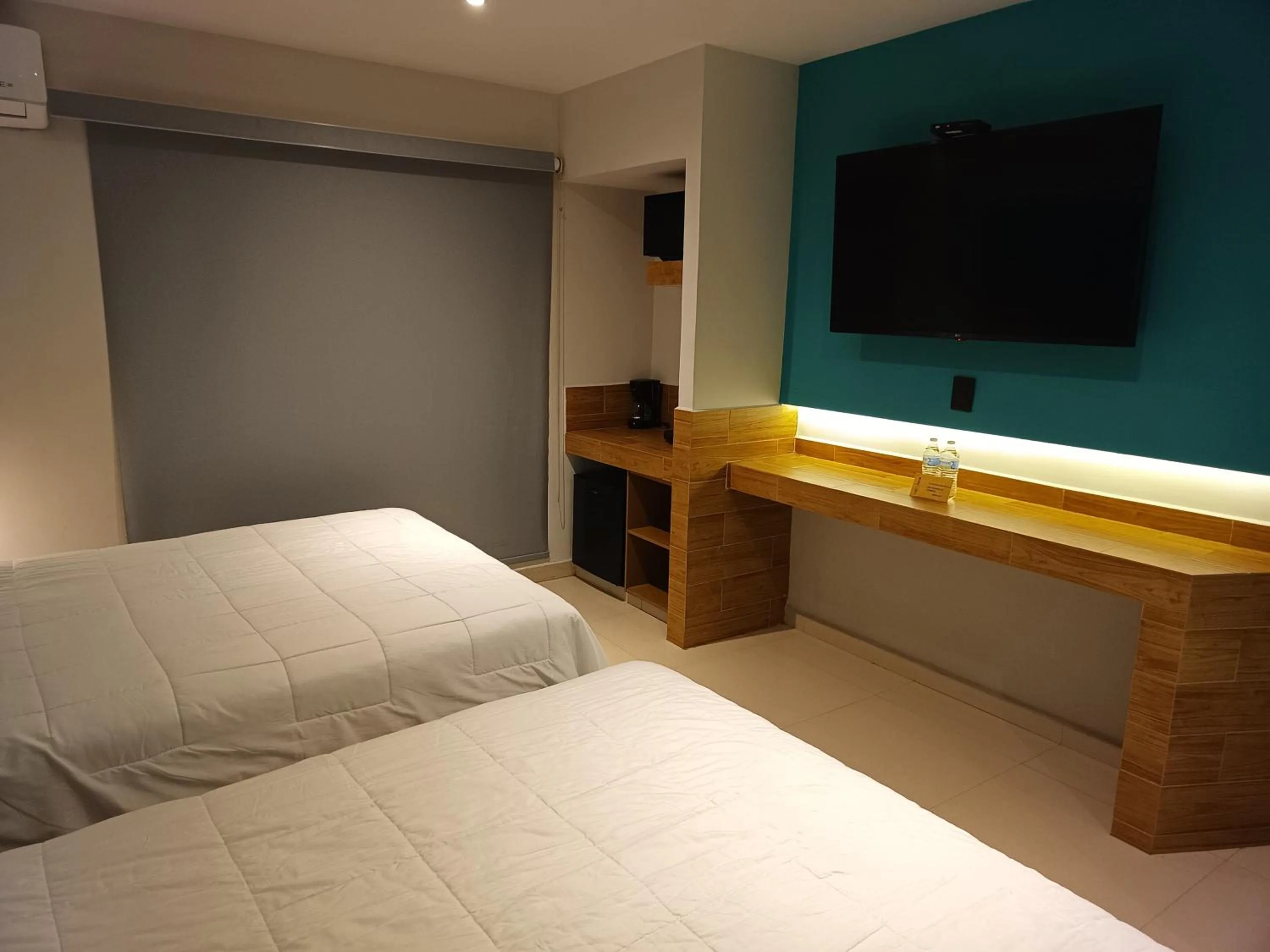 Bed in Hotel Kavia Mazatlán