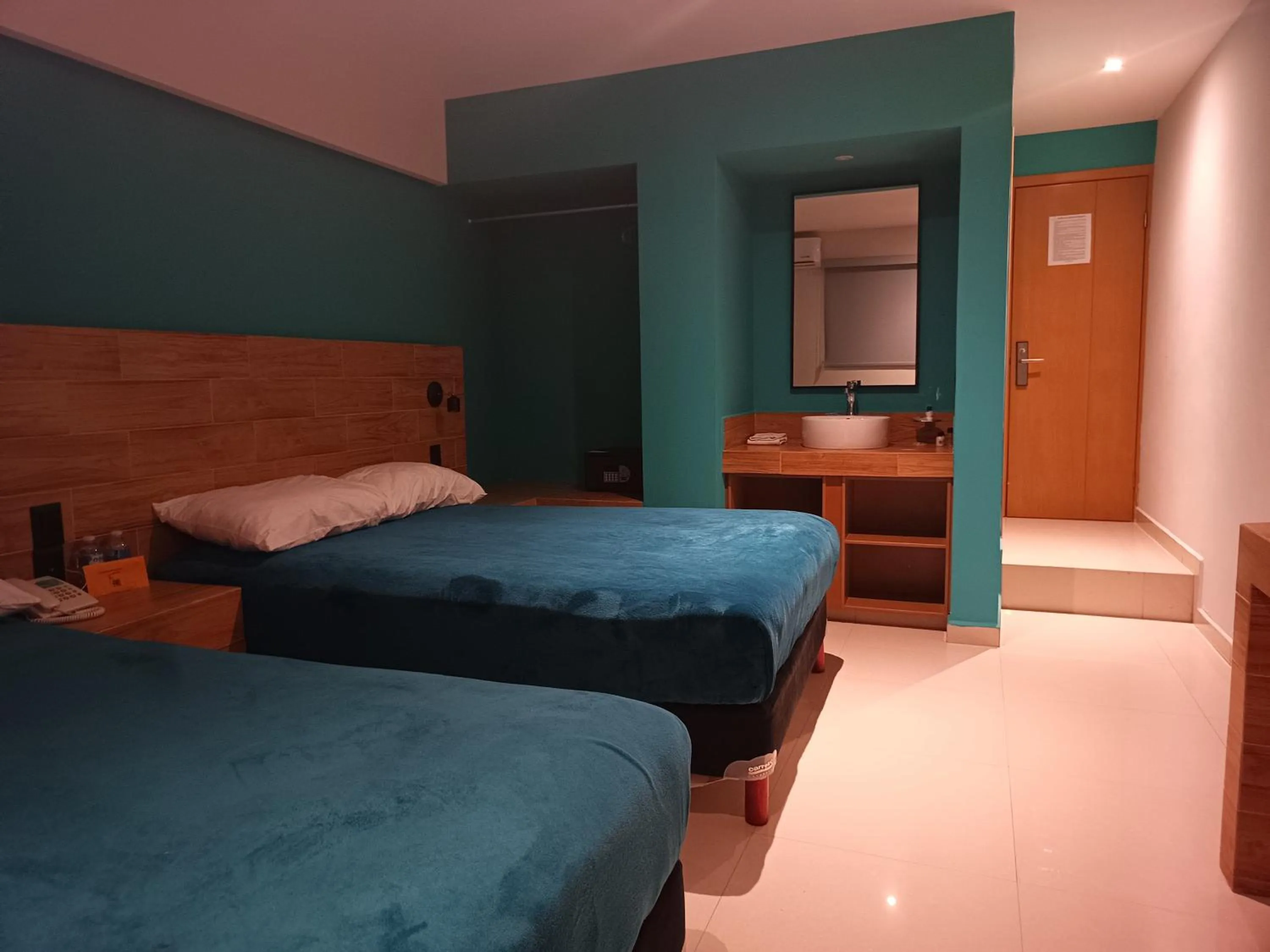 Bed in Hotel Kavia Mazatlán