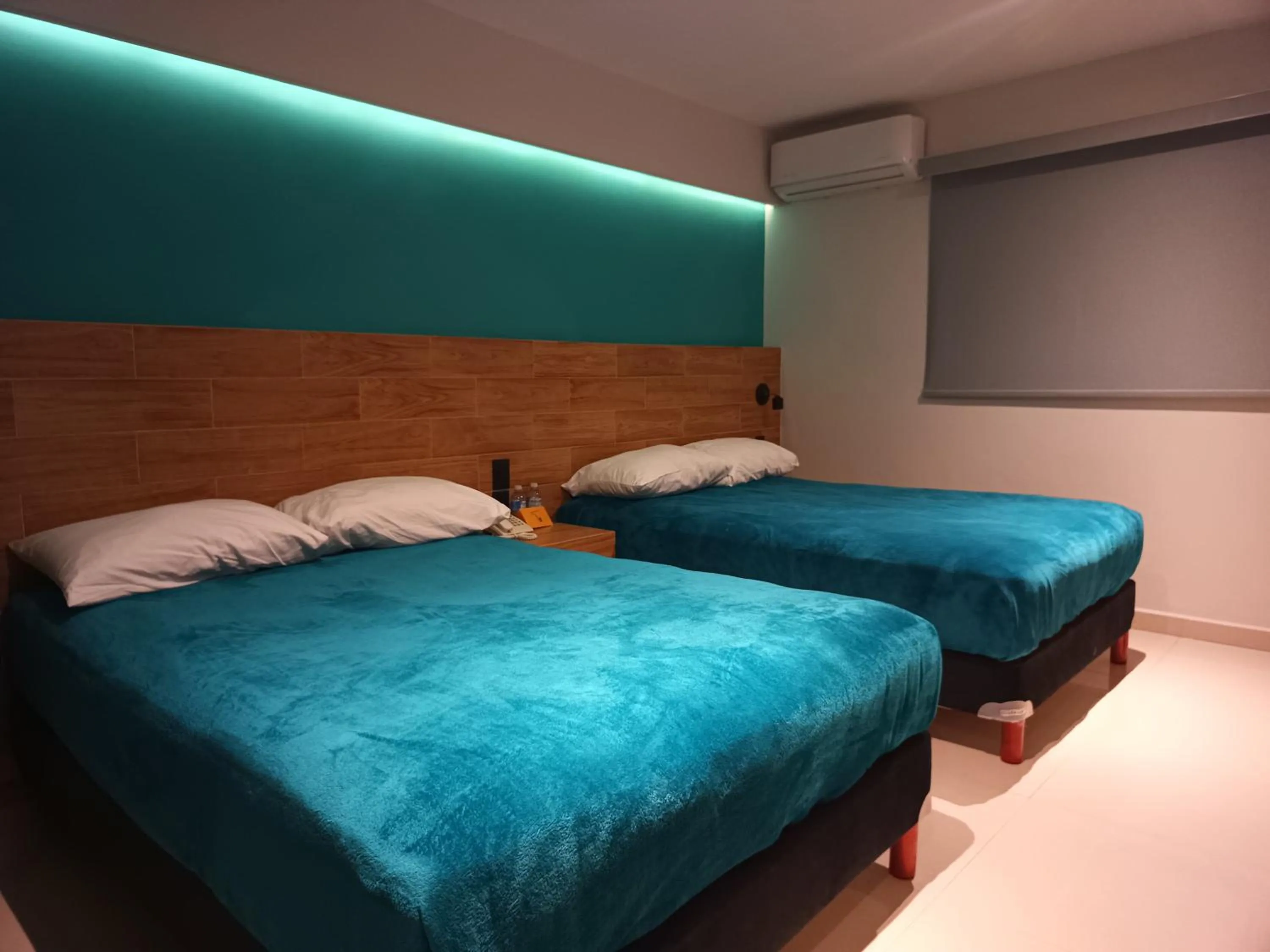 Bed in Hotel Kavia Mazatlán