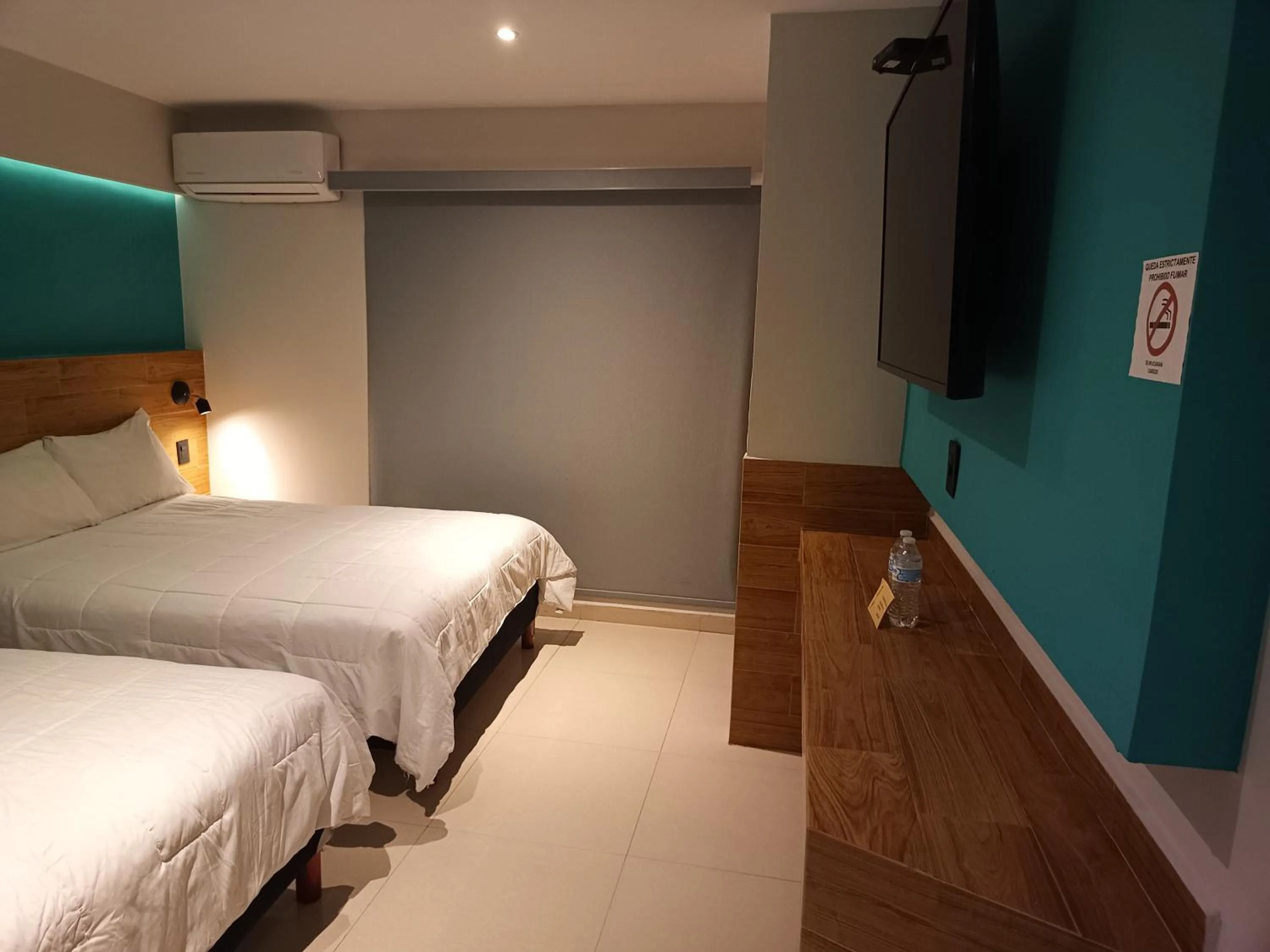 Bed in Hotel Kavia Mazatlán