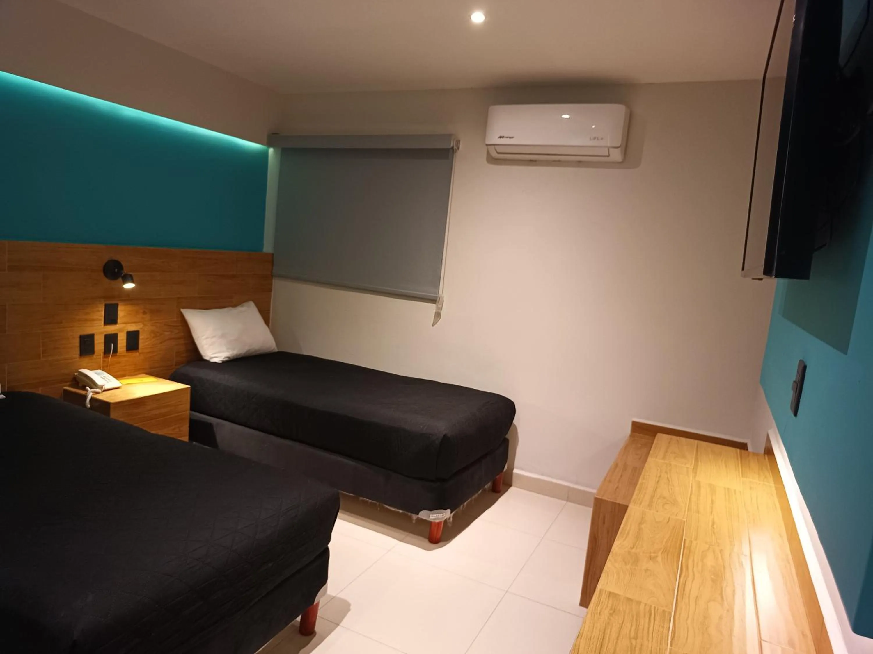 Bed in Hotel Kavia Mazatlán