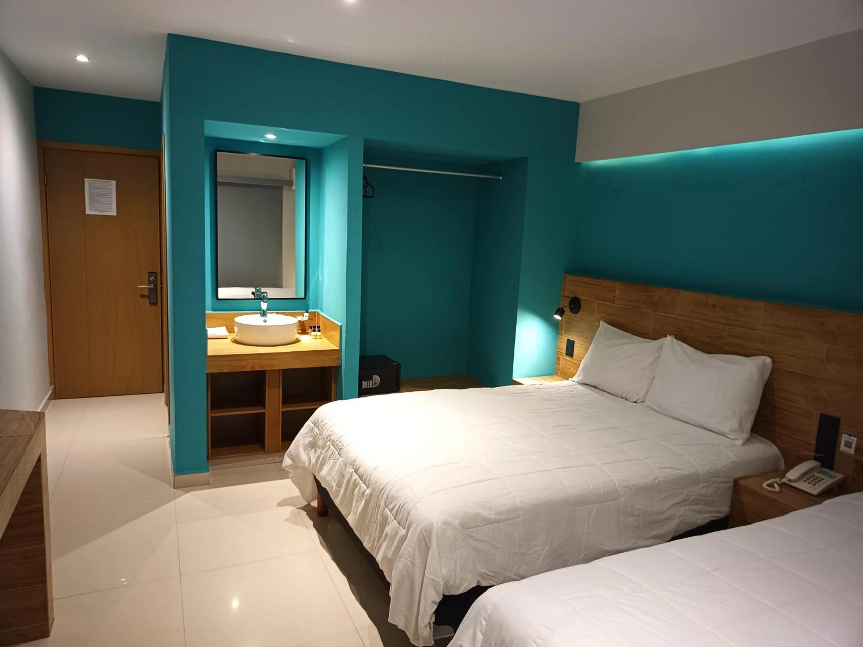 Bed in Hotel Kavia Mazatlán