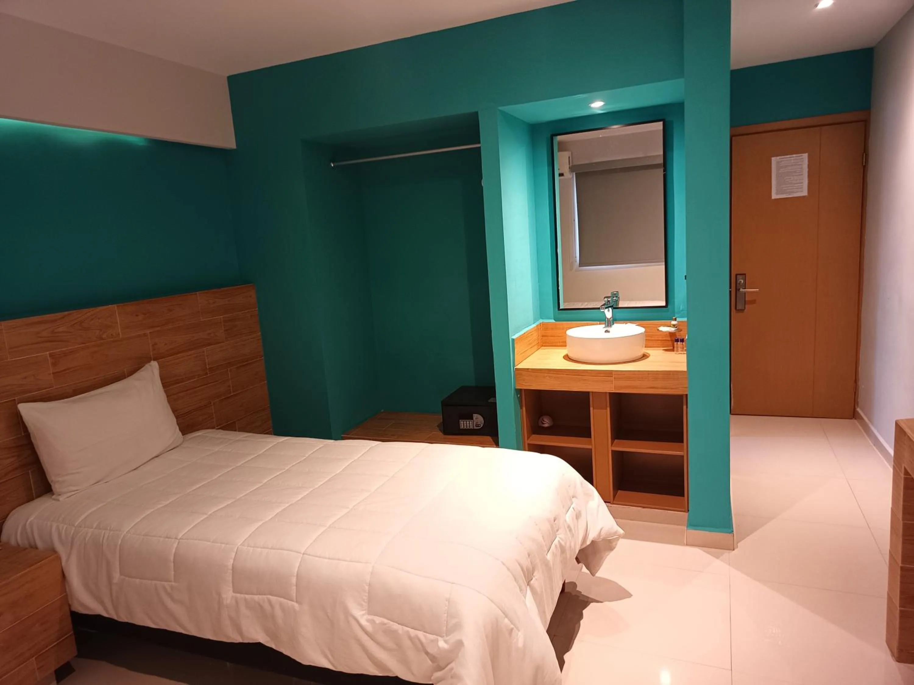 Bed in Hotel Kavia Mazatlán