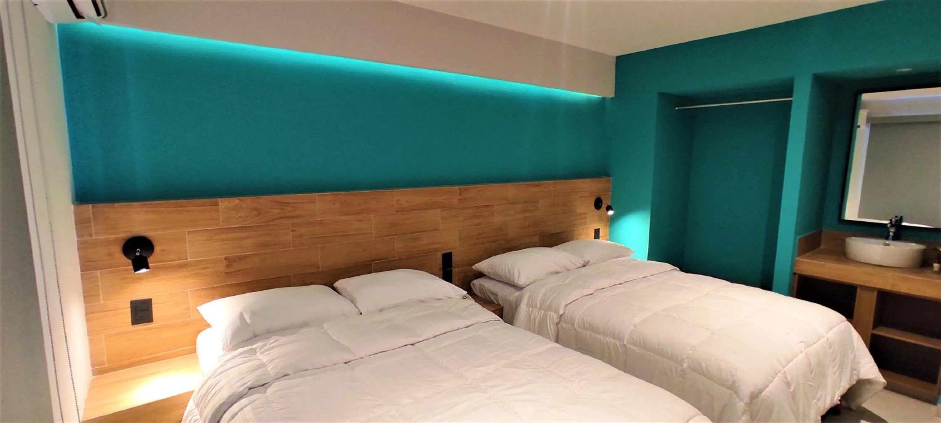 Bed in Hotel Kavia Mazatlán