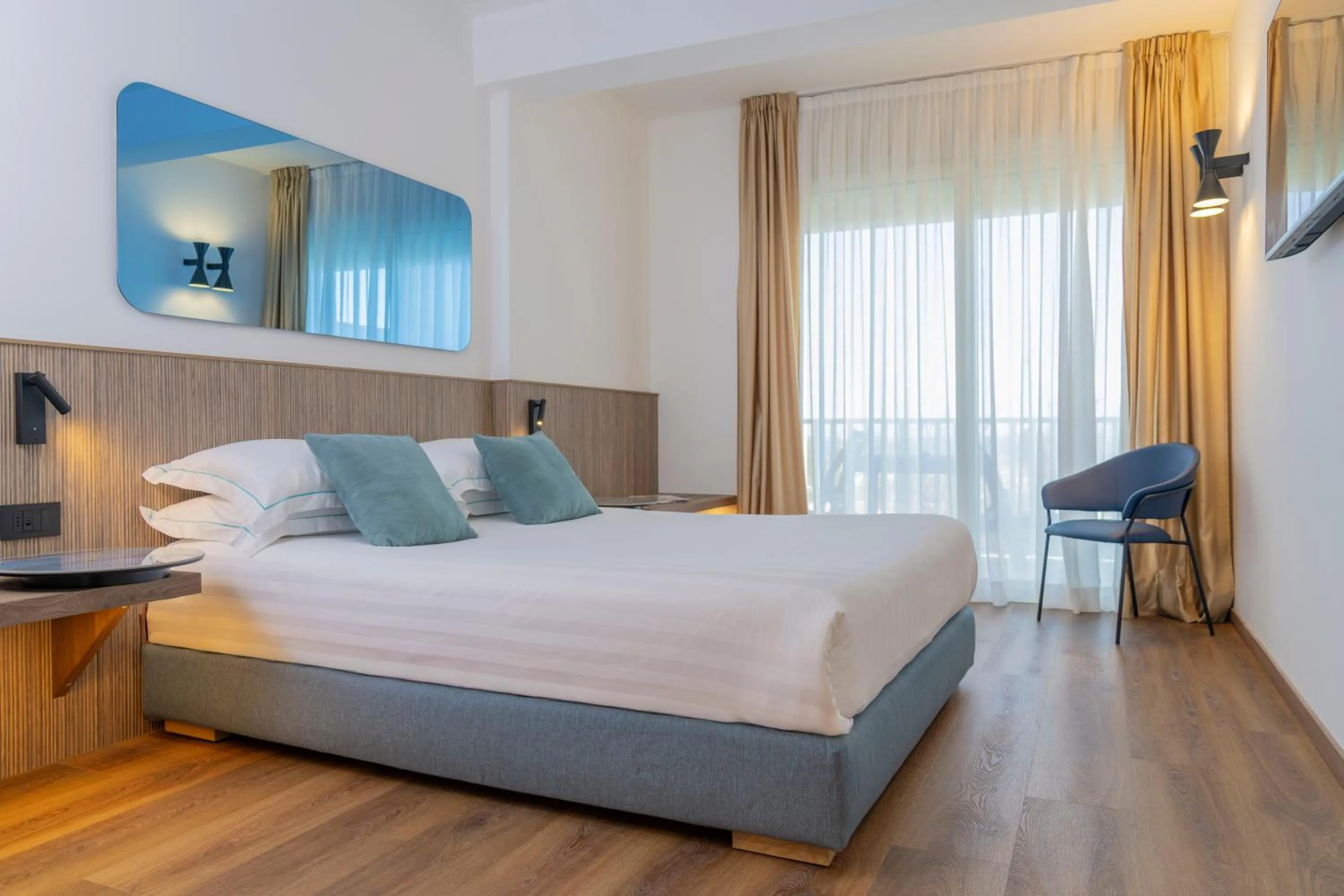 Bed in Le Rose Spa Hotel