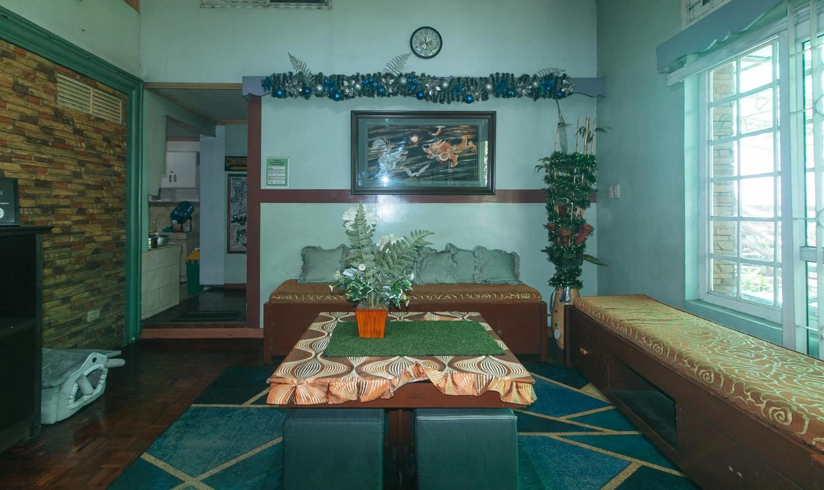 Seating area in RedDoorz Hostel at MRC Residences Baguio