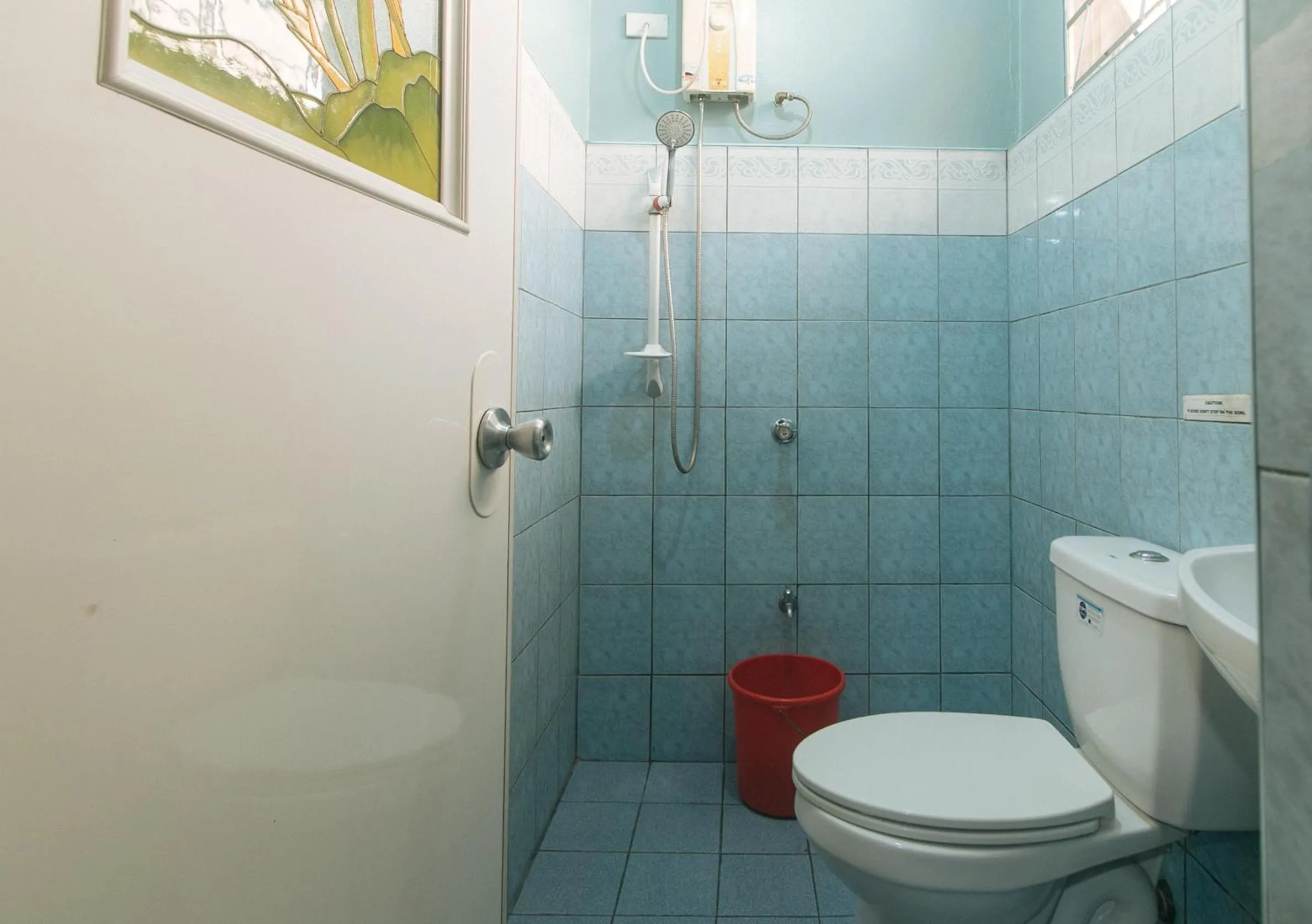 Shower in RedDoorz Hostel at MRC Residences Baguio